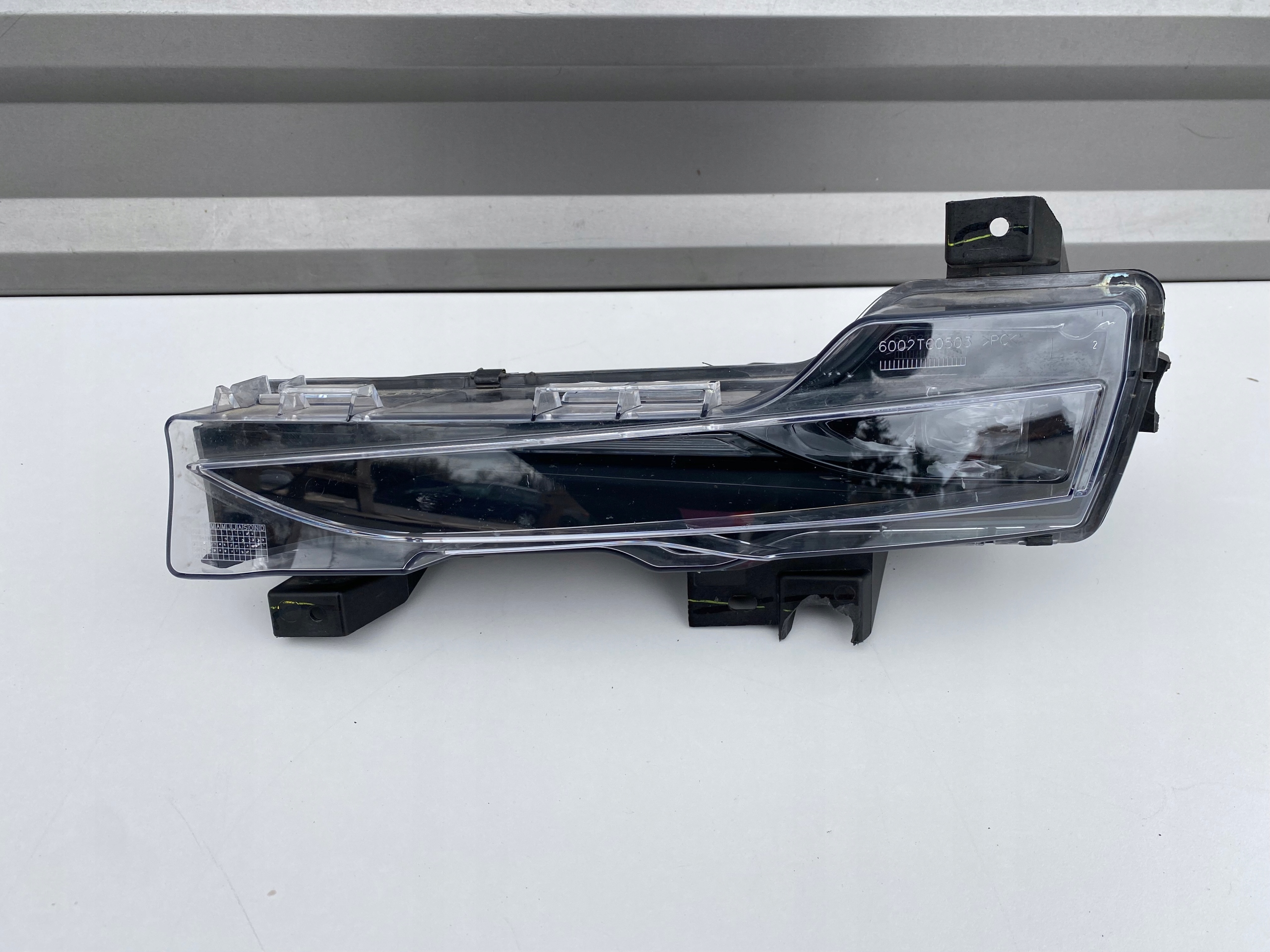 1077395-00-D - ГАЛОГЕН ЛЕВЫЙ TESLA 3 III