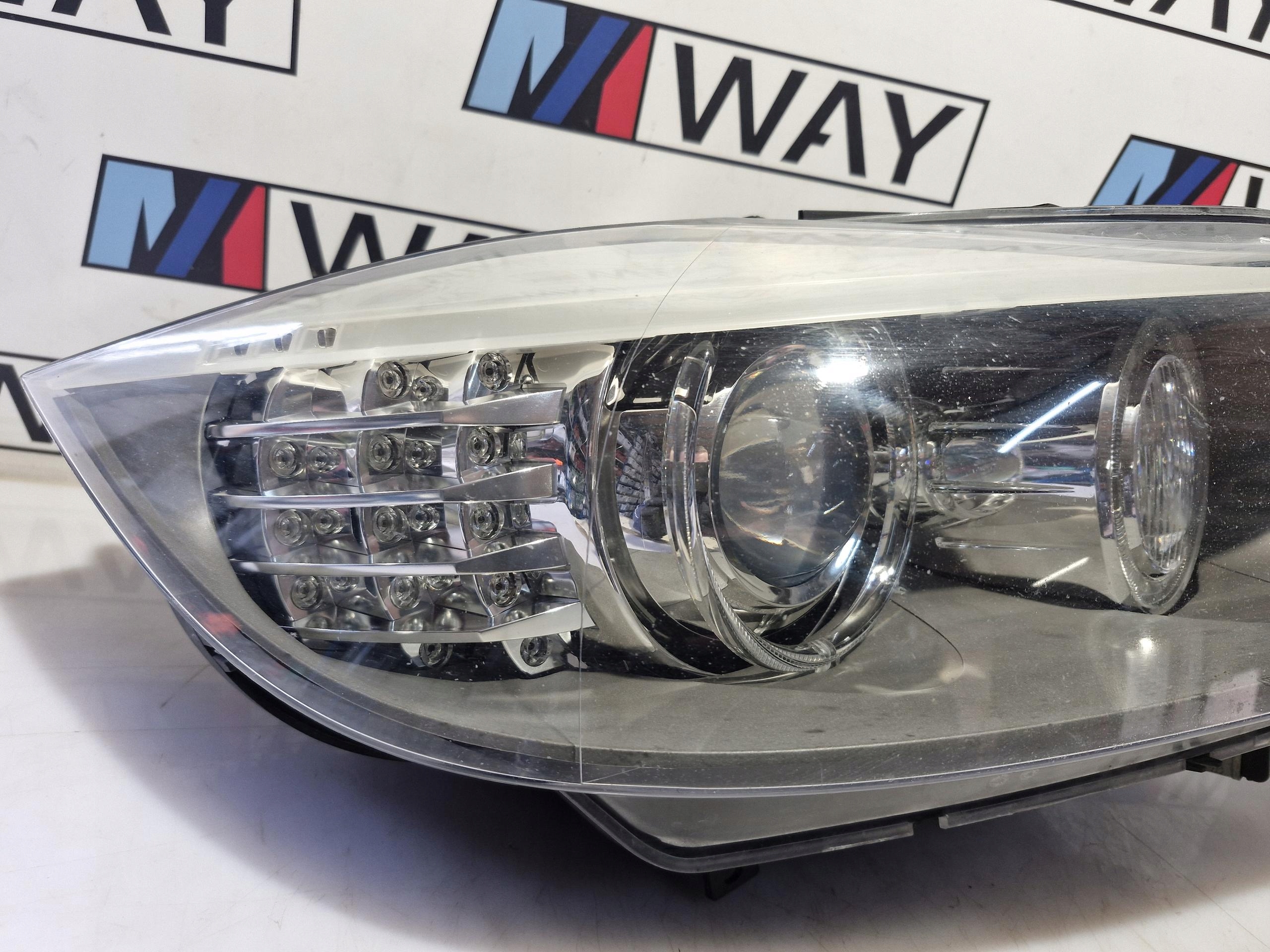 7202590 BMW E90 E91 light right right front BI XENON positioning