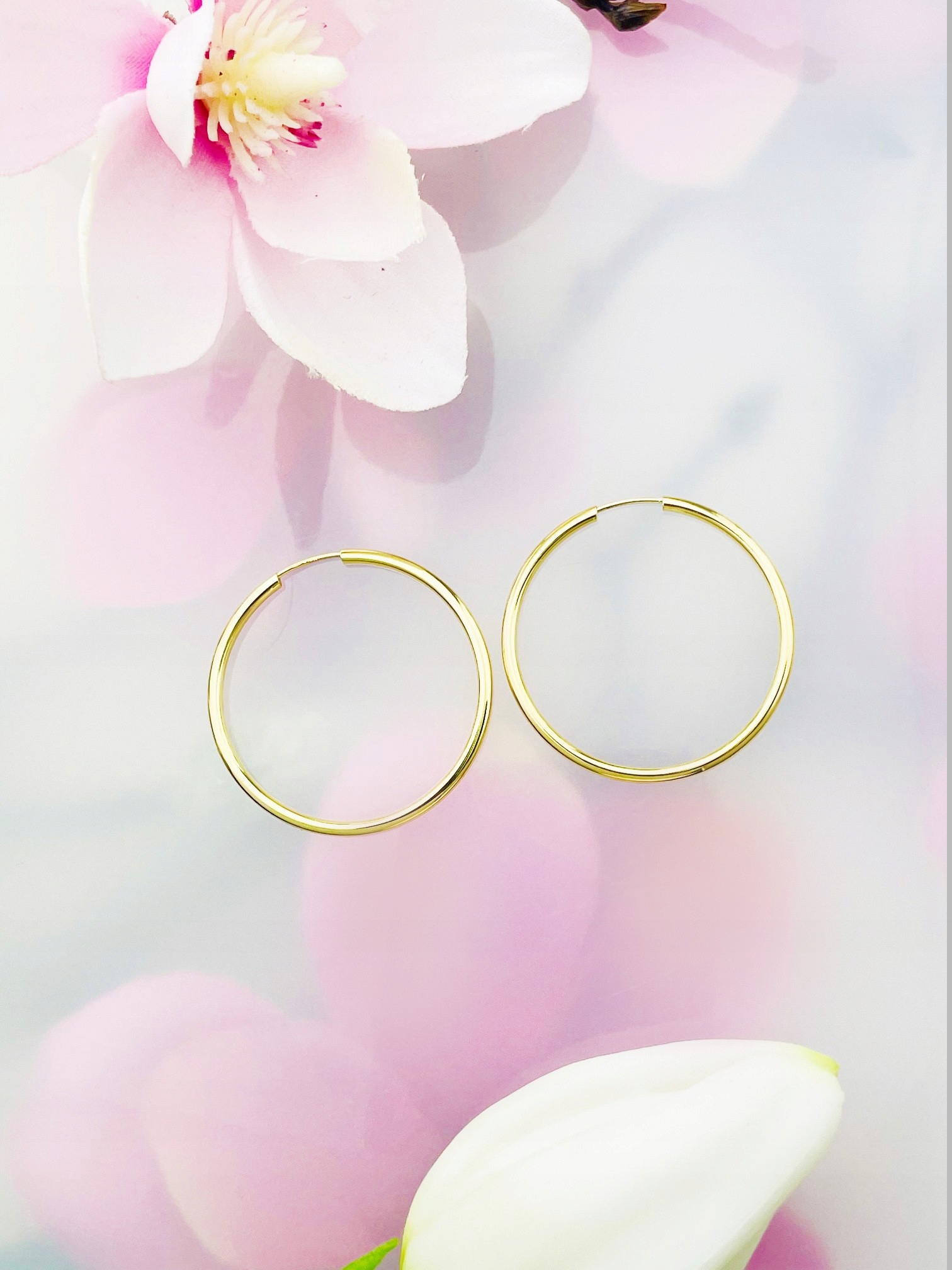 Zlaté náušnice s kolečky, leštěné