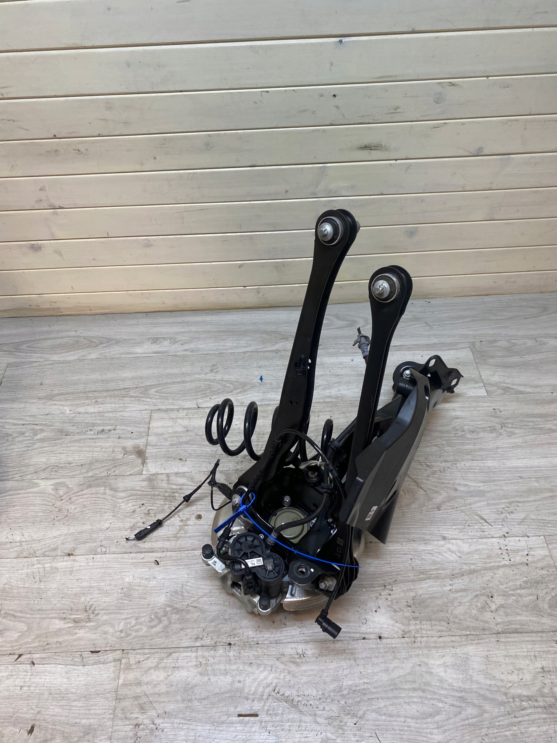 MINI F54 swing arm TARCZ left rear part