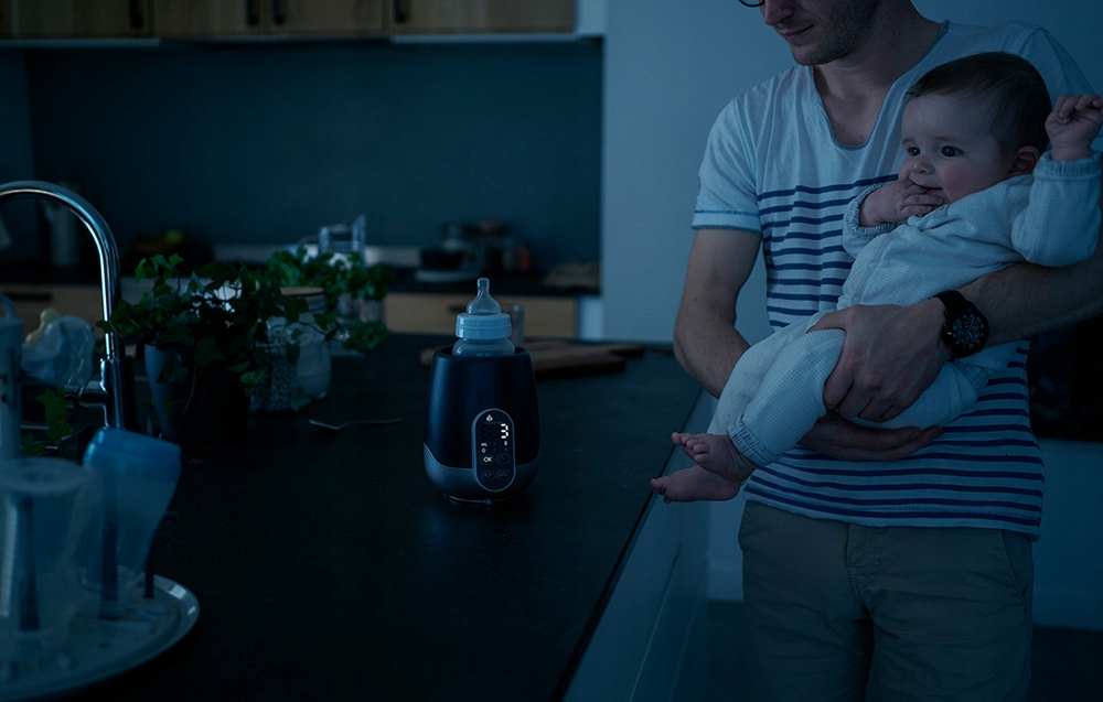 BABYMOOV PRZENOŚNY PODGRZEWACZ DO BUTELEK MLEKA 2W1 SAMOCHODOWY / DO DOMU Moc 100 W