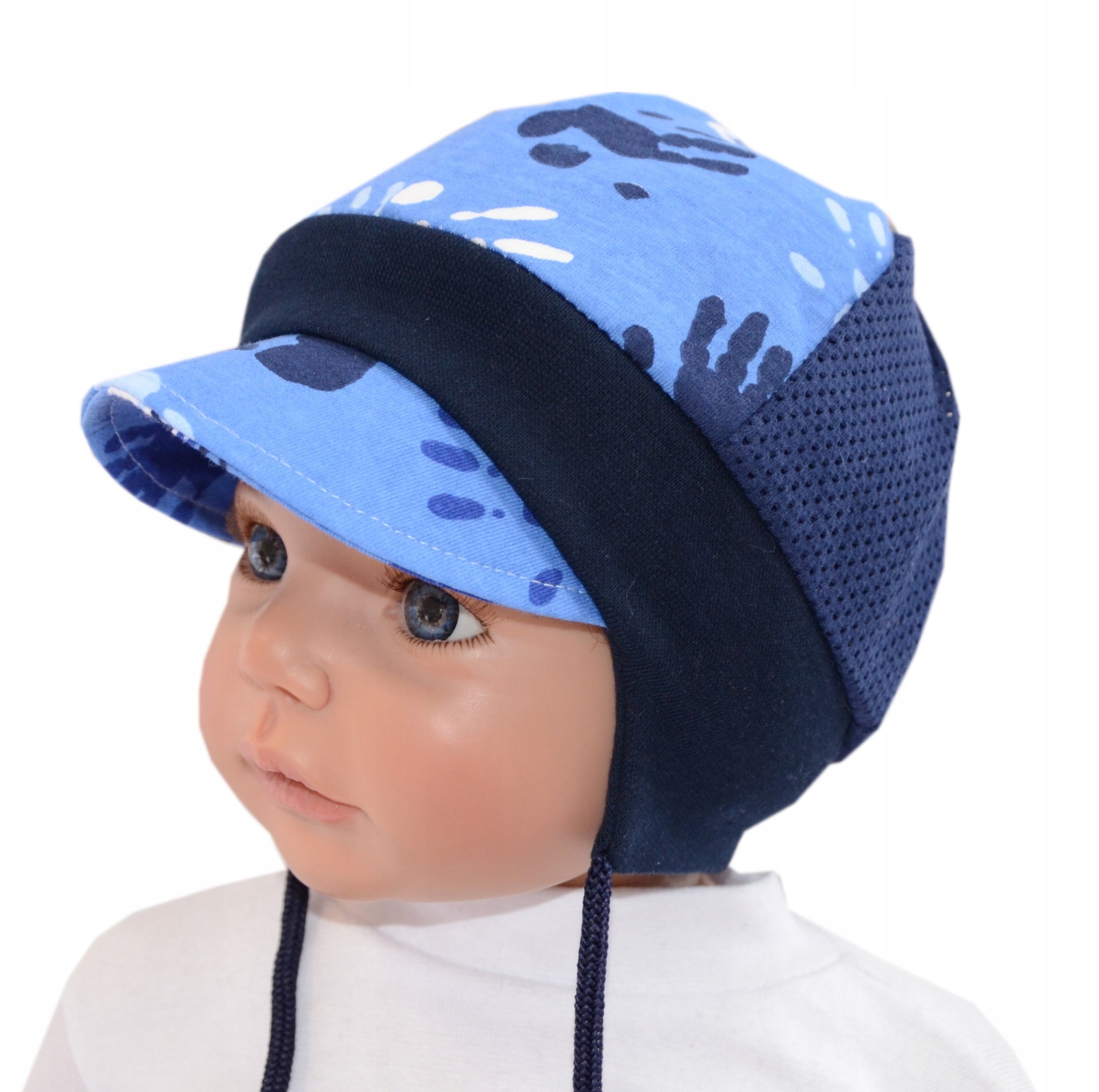 

Letnia ażurowa czapka z daszkiem 47-51cm 18-36m