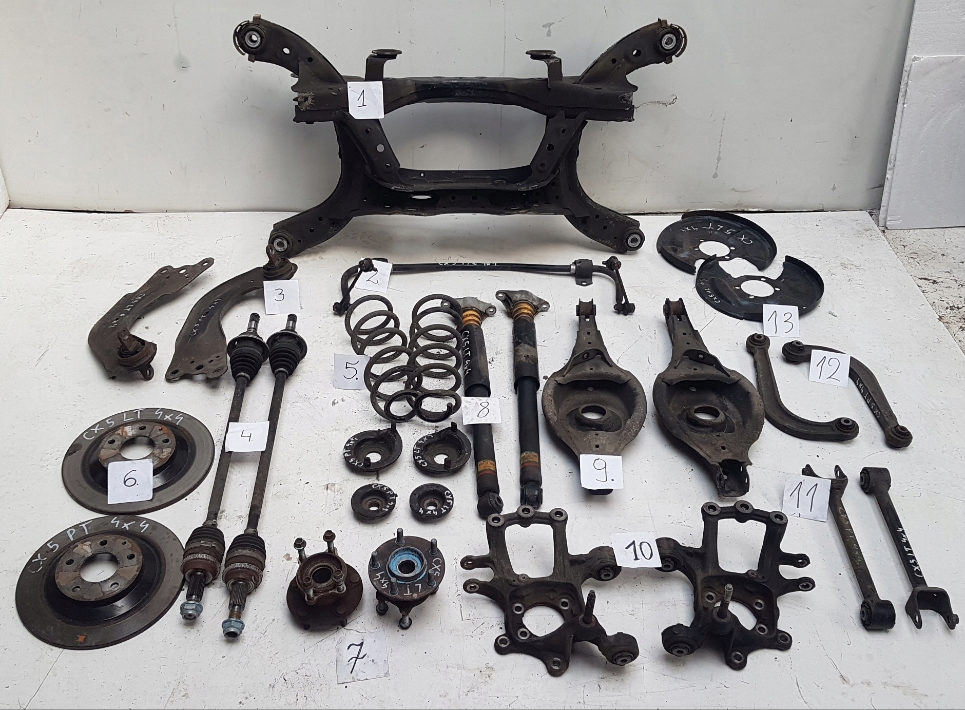 поворотный кулак, цапфа зад правая левый mazda CX5 4x4