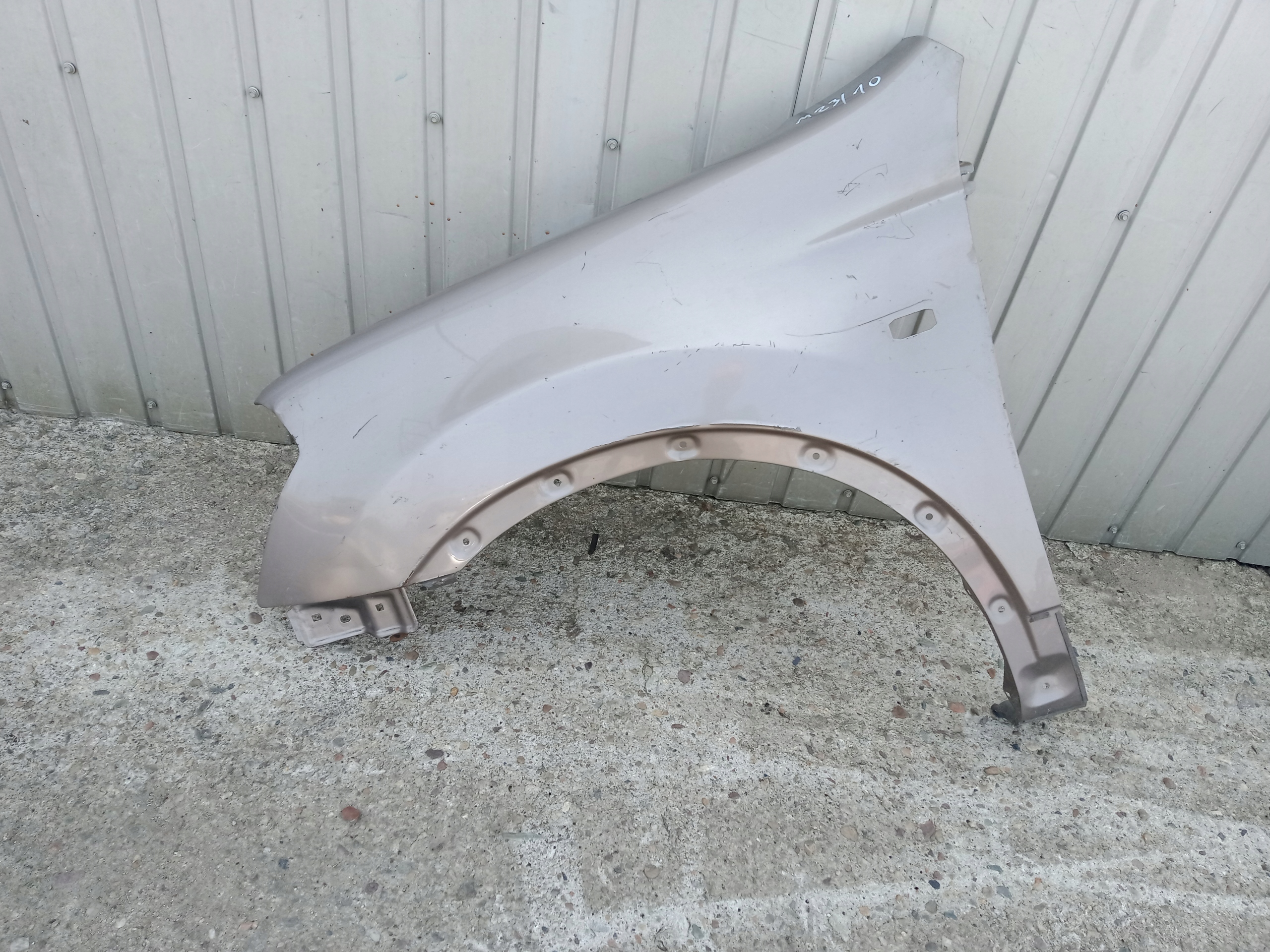 NISSAN QASHQAI 1 I J10 06-09 BŁOTNIK LEWY PRZEDNI