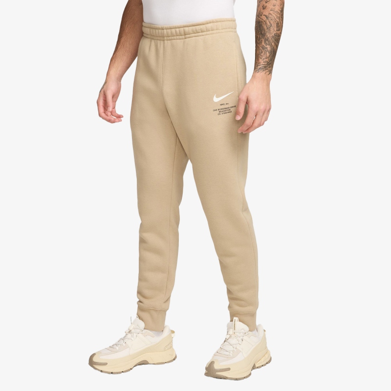 Spodnie dresowe męskie Nike Nsw Athletic Jogger beżowe IB6481-297 r. L