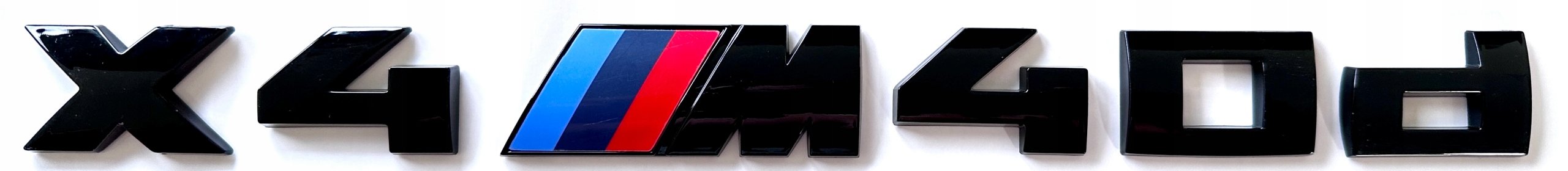 Bmw X4 M 40d G02 emblém , logo, znak nápis, čierna