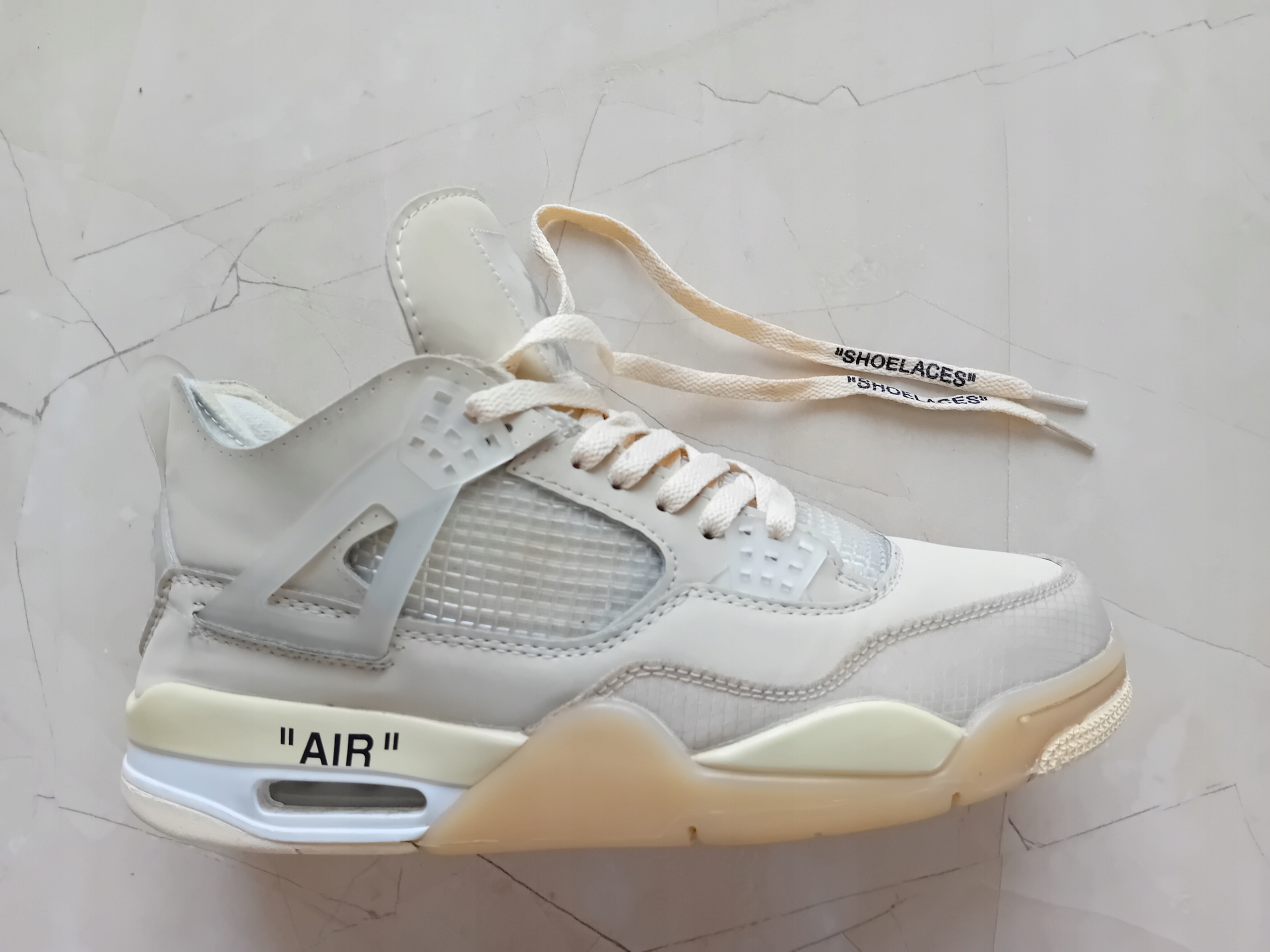air jordan off white 4 sail