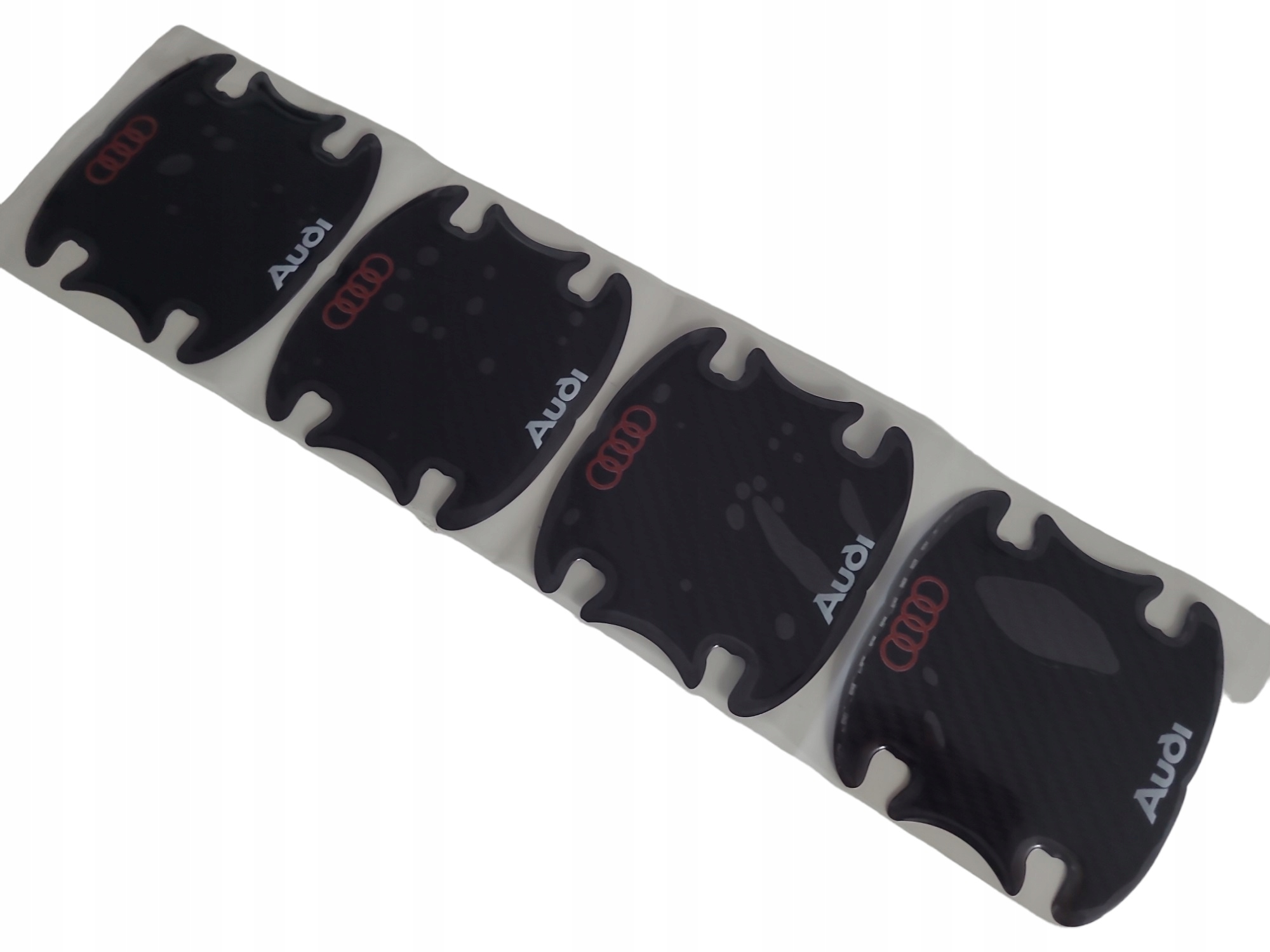 

Naklejki ochronne pod klamkę do Audi Carbon