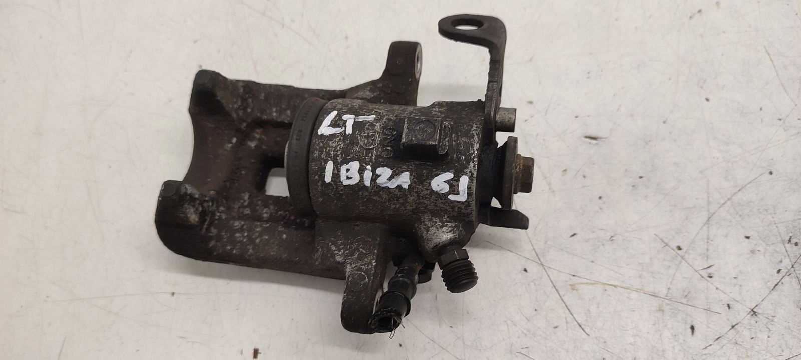 caliper rear part rear left Seat Ibiza 6J 5D 1,6 TDI