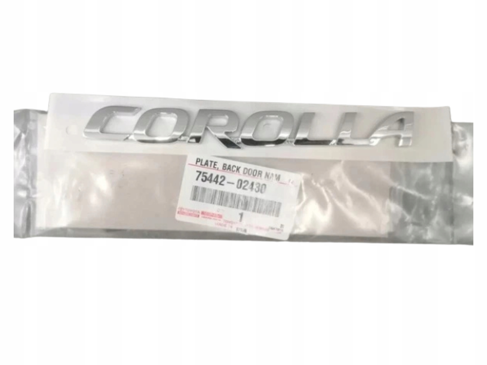 Toyota Corolla Chrómovaný emblém zadný 75442-02430 Oe