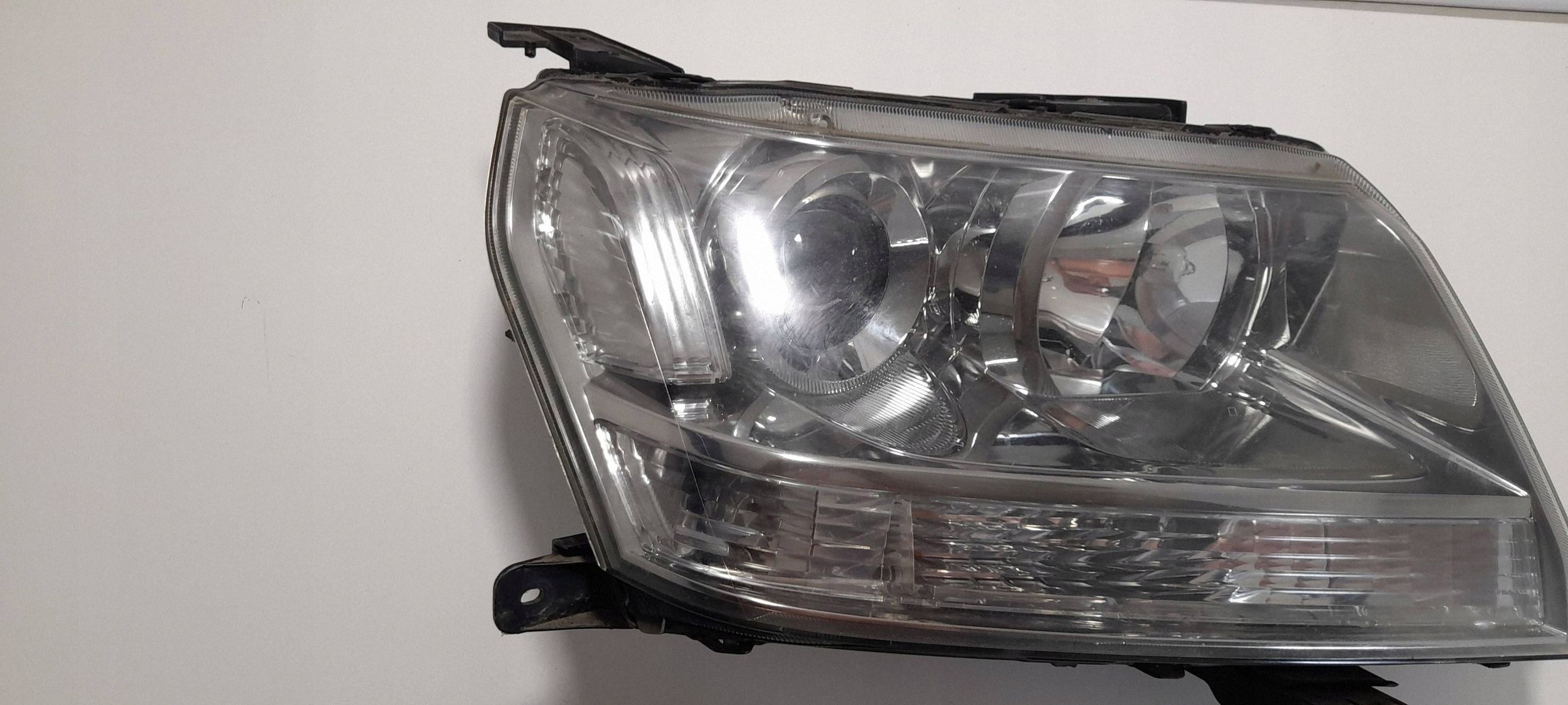 Suzuki Grand Vitara II Reflektor right 10059079 (R463)