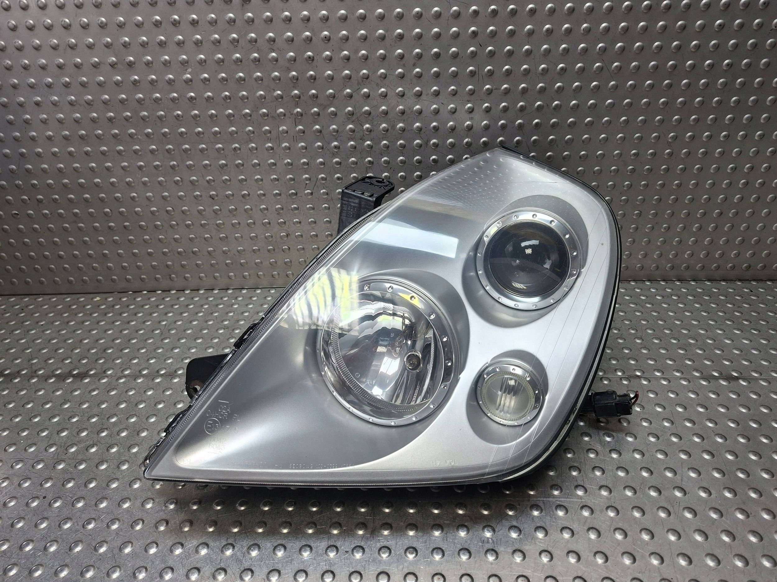 light left REFLEKTOR SSANGYONG REXTON and 01-06 EUROPA 108-0399
