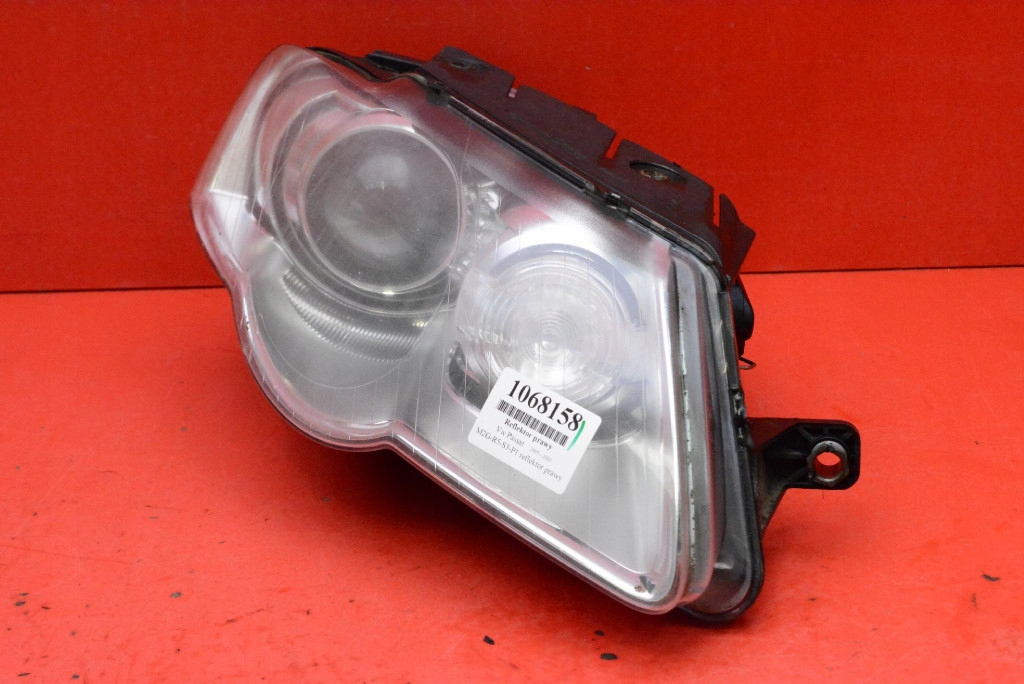 REFLEKTOR right light front lens XENON EU 89312669 VW PASSAT B6 05-10