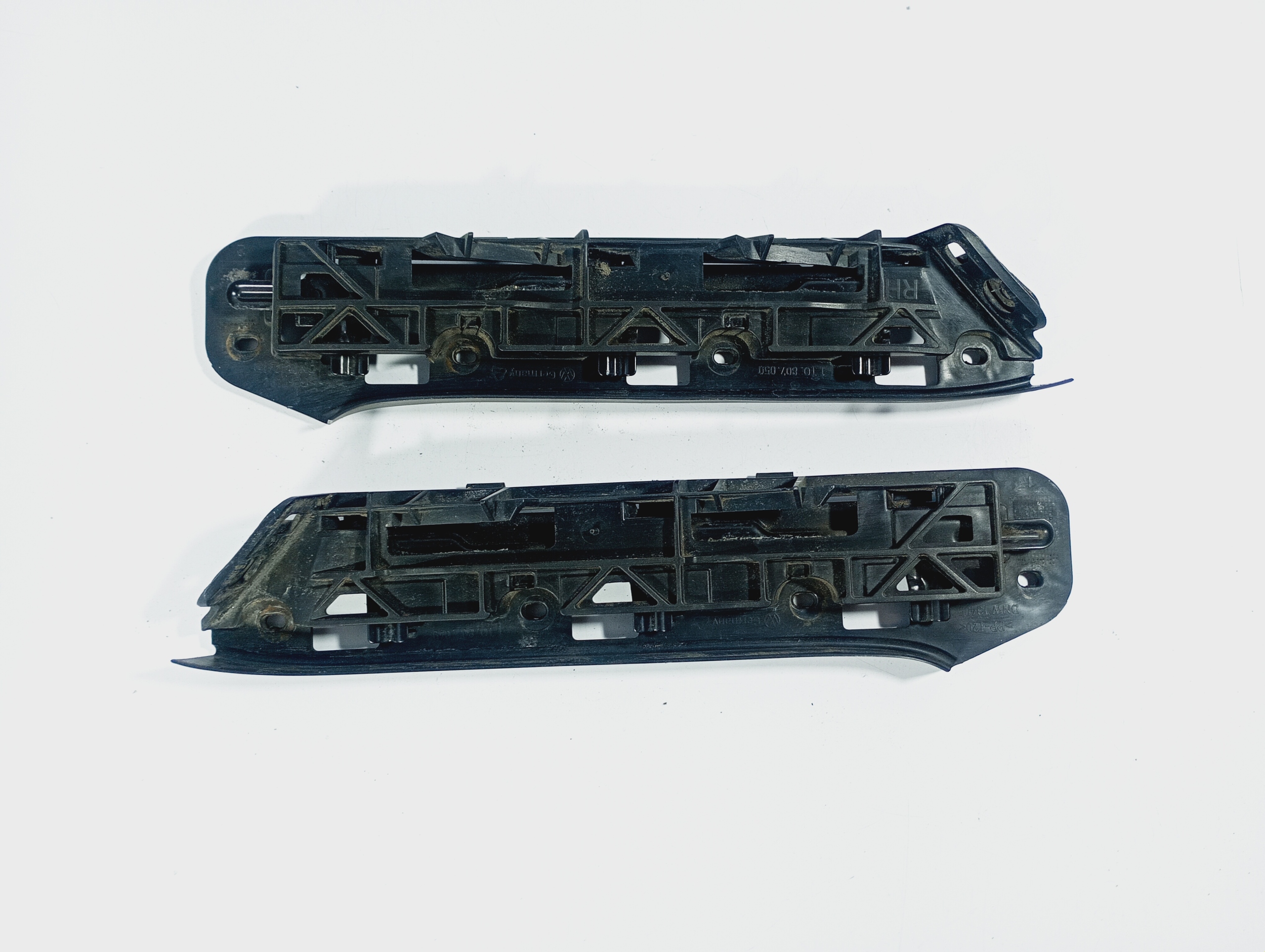 moulding bumper bracket left right front OE 1T0807049 VW CADDY 3 III 04-10