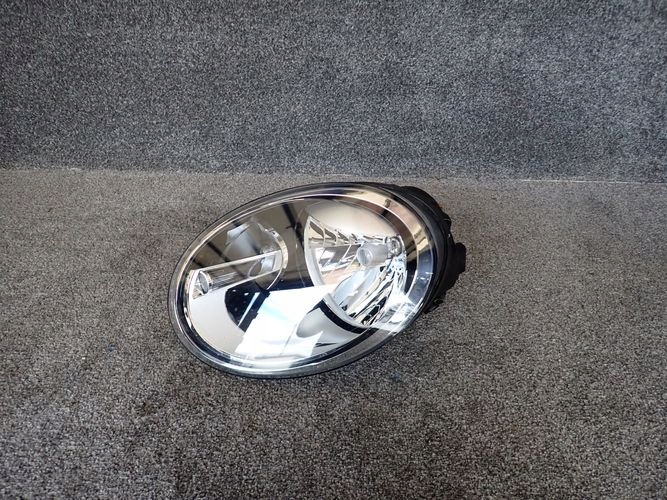 VW NEW BEETLE 11- reflektor left light left