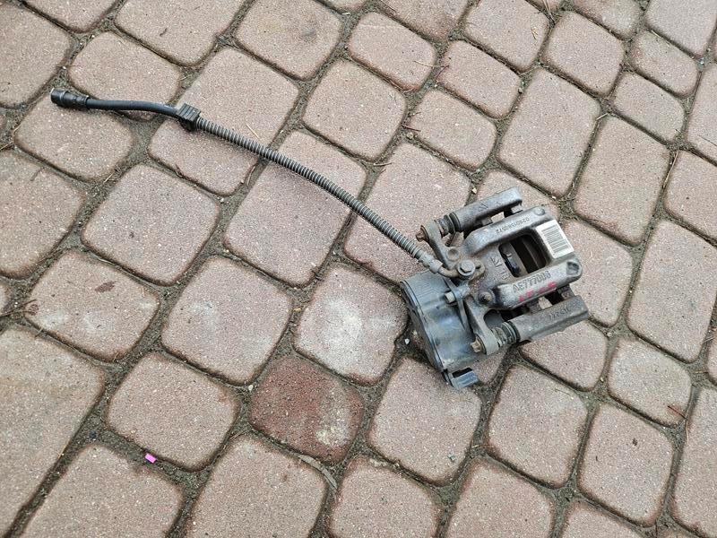 caliper rear part rear electrical left Opel Corsa F E-Corsa 9819059380