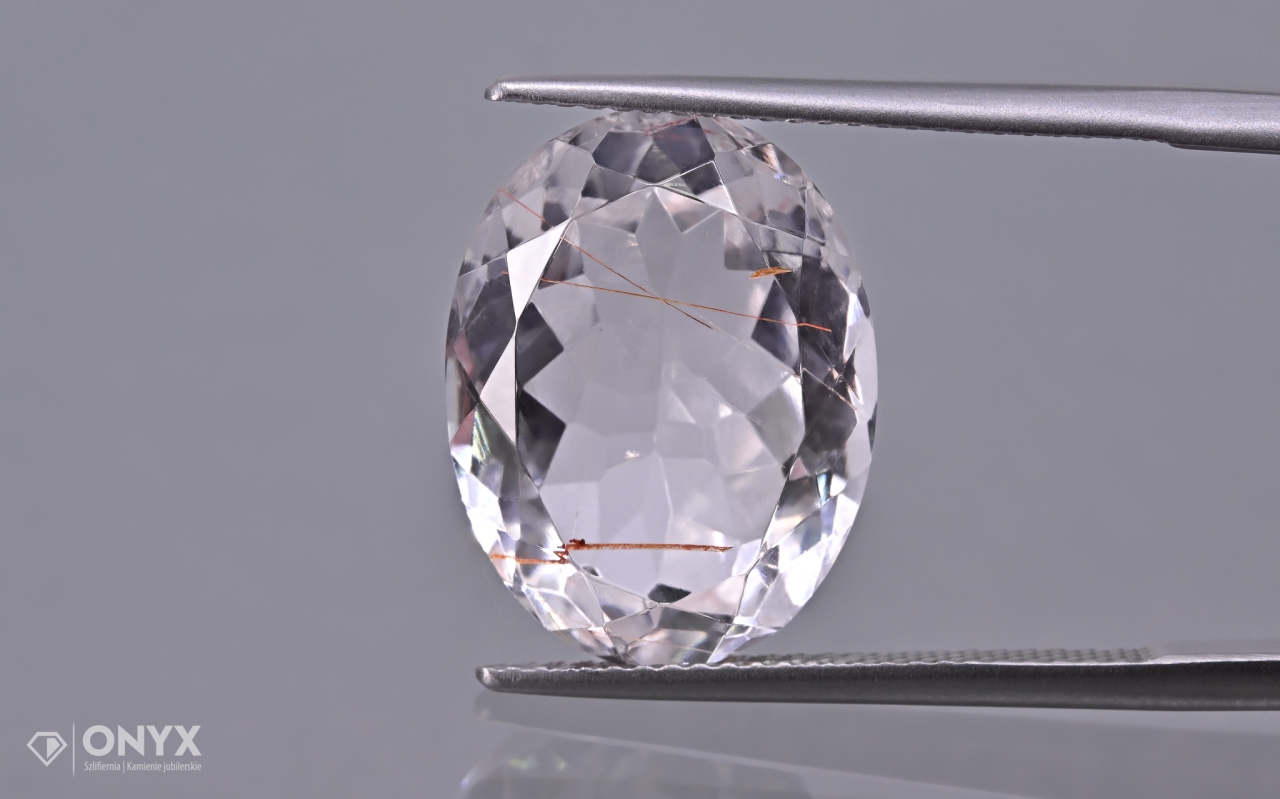 Křemen s rutilem fazetovaný ovál 17x13 mm