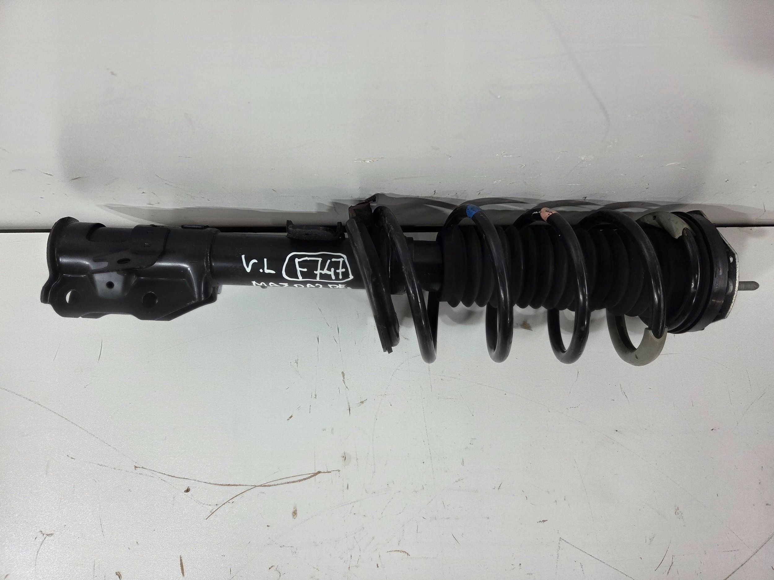 Mazda 2 DE shock absorber front left (f747)