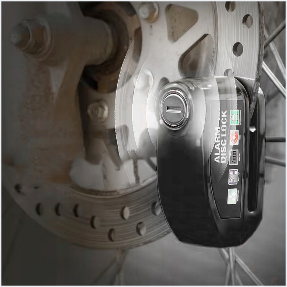 BLOKADA ROWEROWA ALARM ZAPIĘCIE NA TARCZĘ HAMULCOWĄ ROWER KOŁO ZĘBATE 110dB Waga 335 g