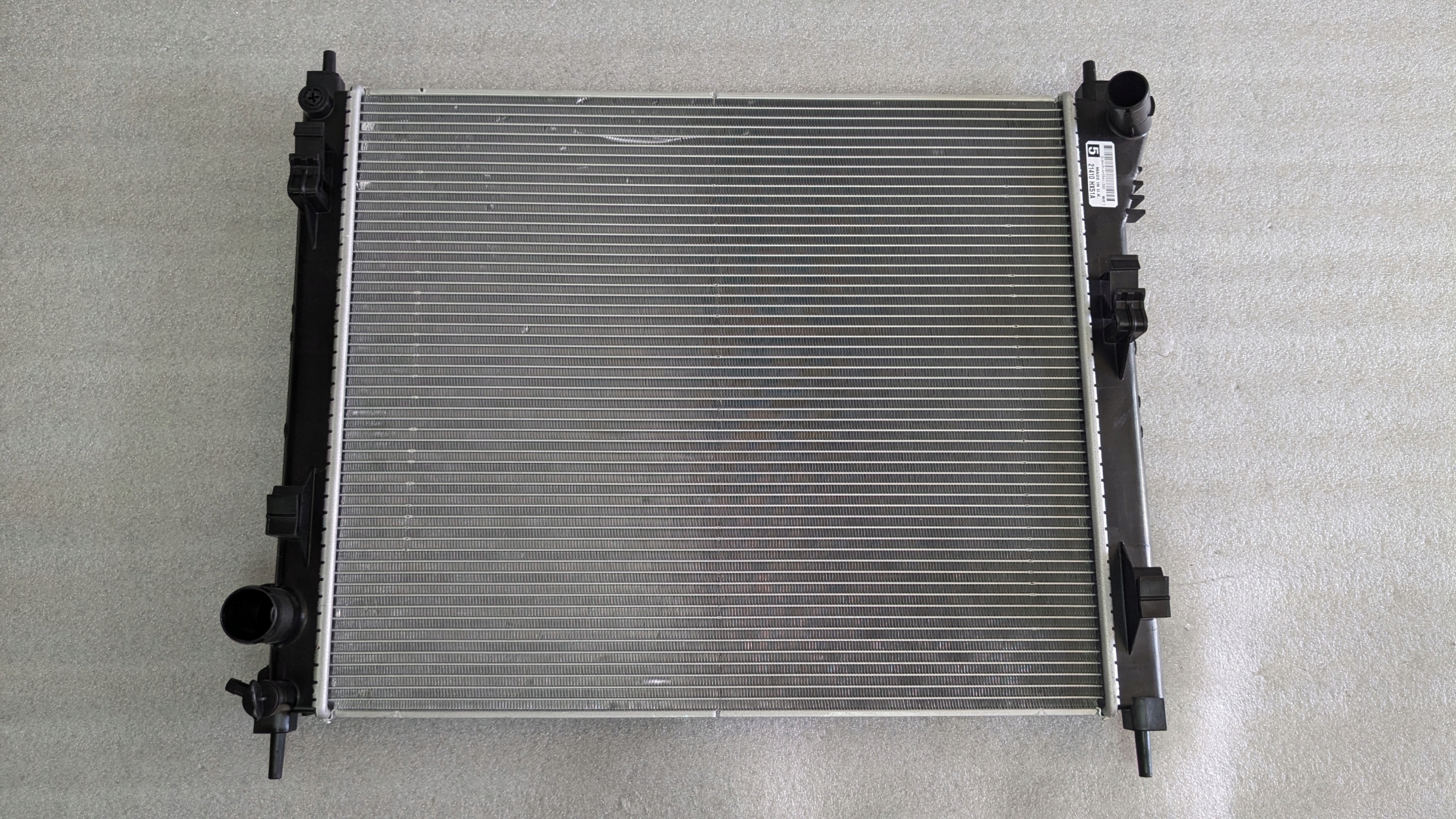 M NOWA ORYGINALNA CHŁODNICA WODY NISSAN JUKE PULSAR 2014 - 2018 21410HX51A