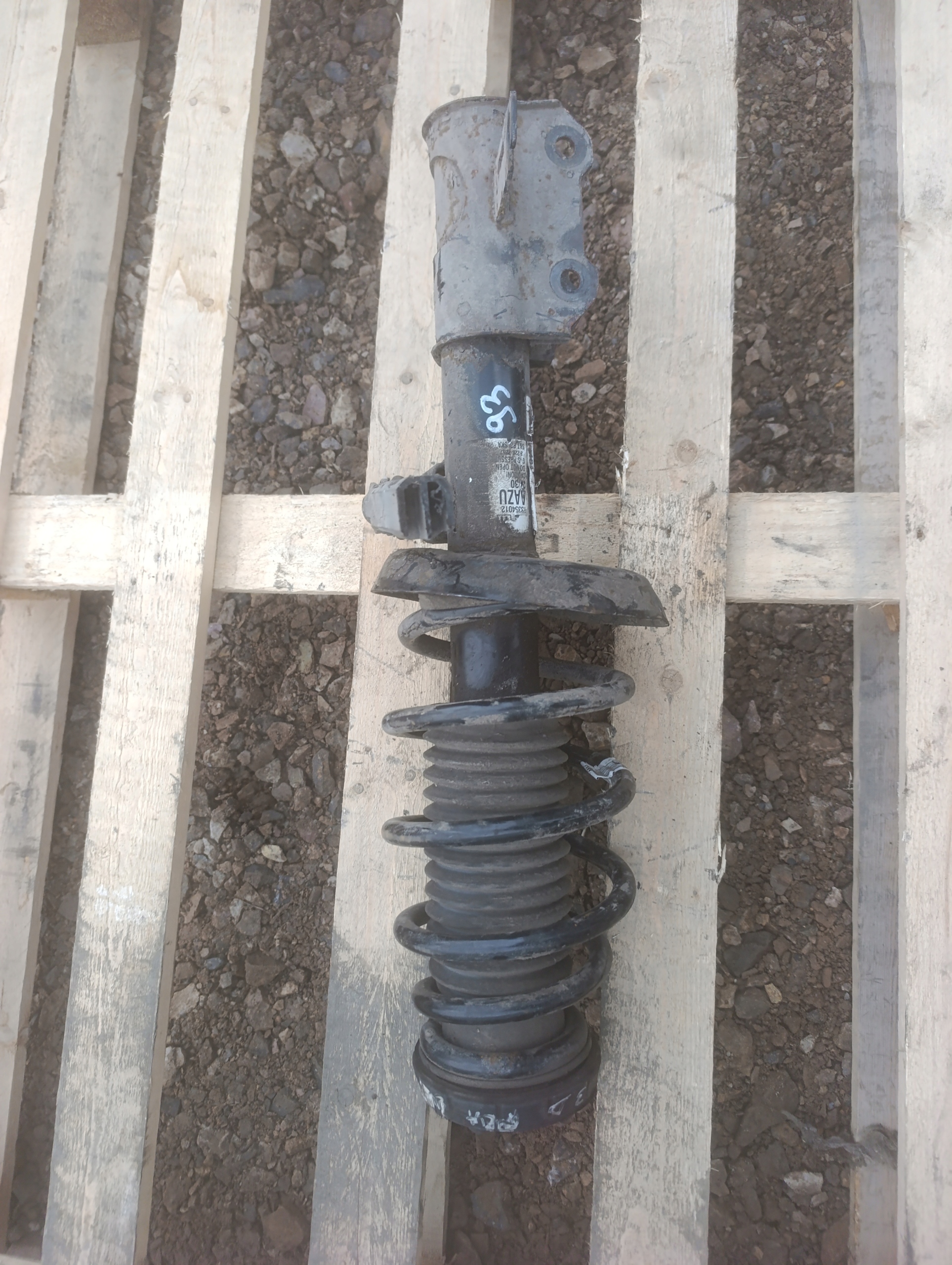 Macpherson shock absorber Opel Astra J right front front 13354012