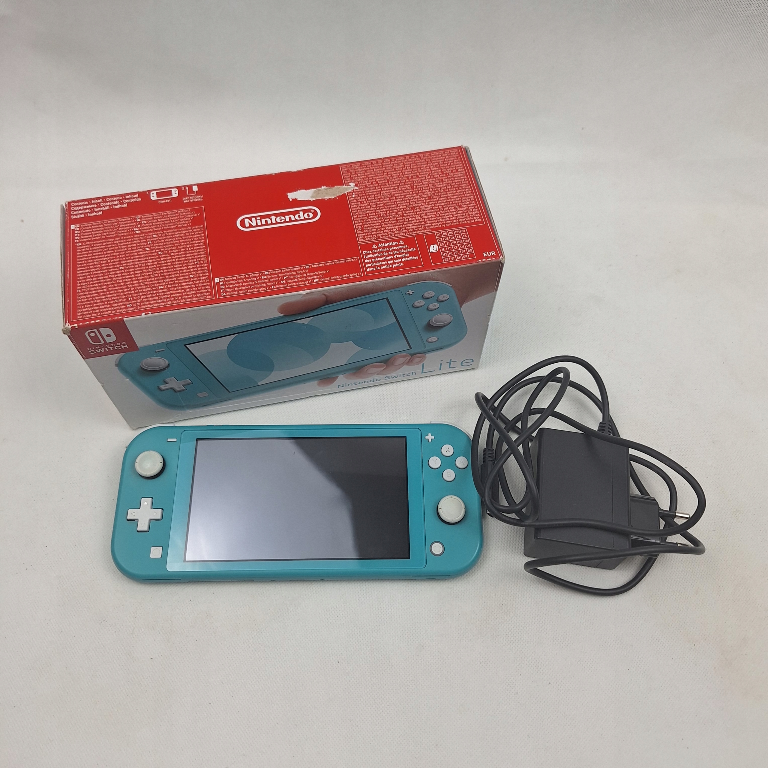 KONSOLA NINTENDO SWITCH LITE TURQUOISE TURKUSOWY HDH-001 + ZASILACZ KARTON Gry w zestawie nie