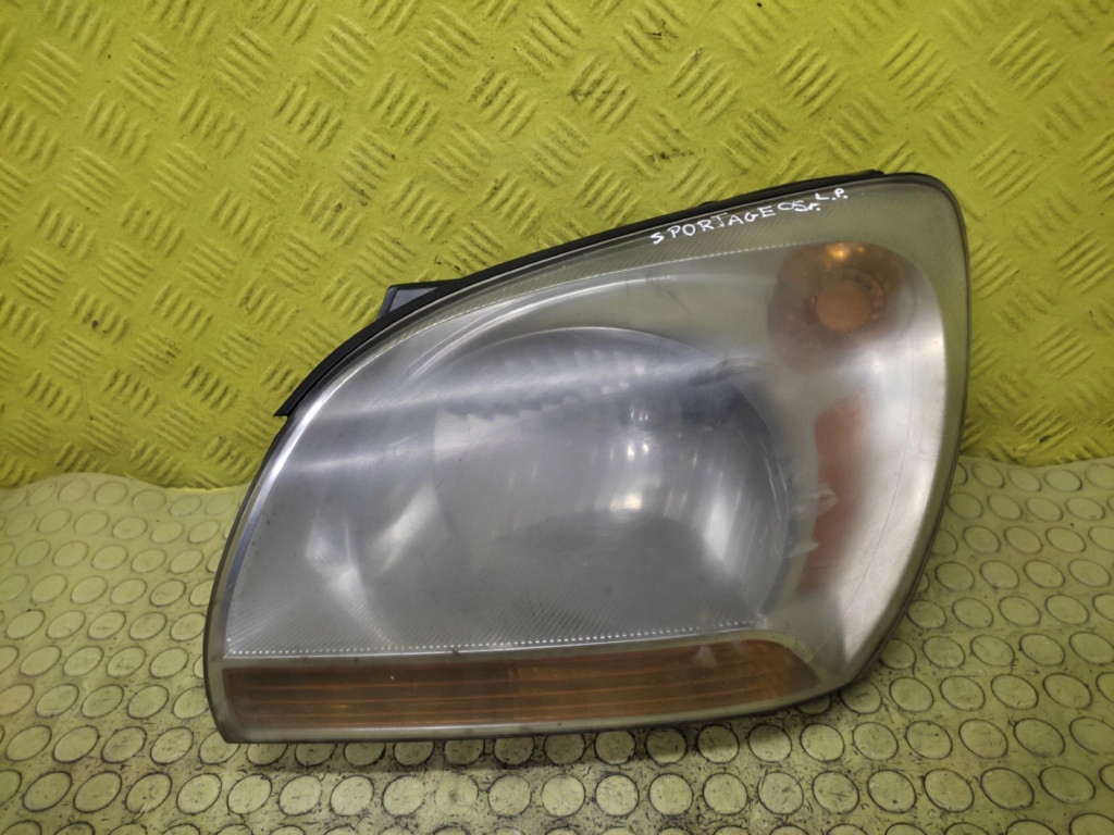 KIA SPORTAGE II REFLEKTOR light left front