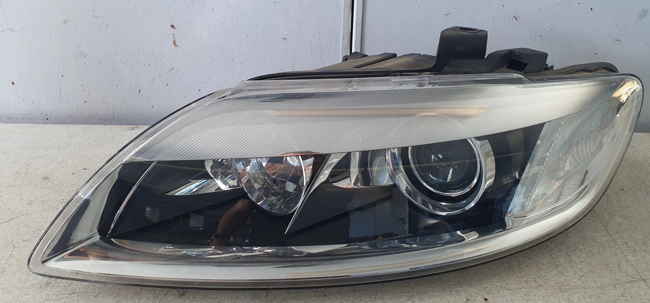 AUDI Q7 4L 05-09 REFLEKTOR light left XENON positioning 4L0941003B