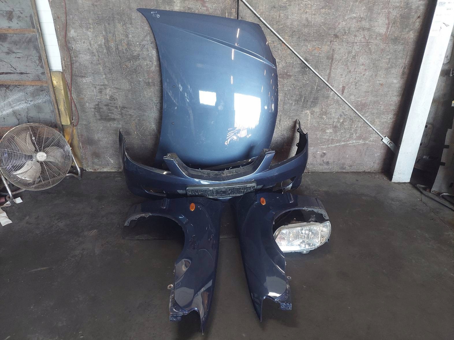 complete front bonnet bumper light fender MAZDA 323F BJ 22A