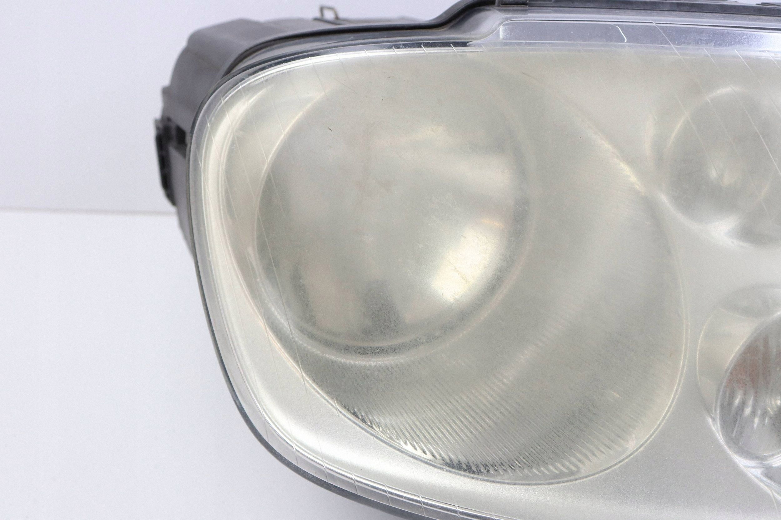 VW TOURAN and light front right front 1T0941006F EUROPA