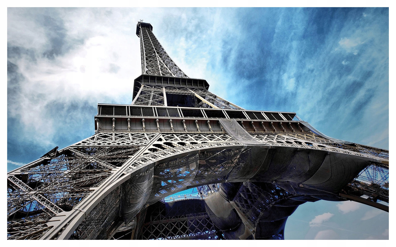 Vliesová fototapeta Eiffelova věž Paříž světle modrá mraky 254x184 lepidlo