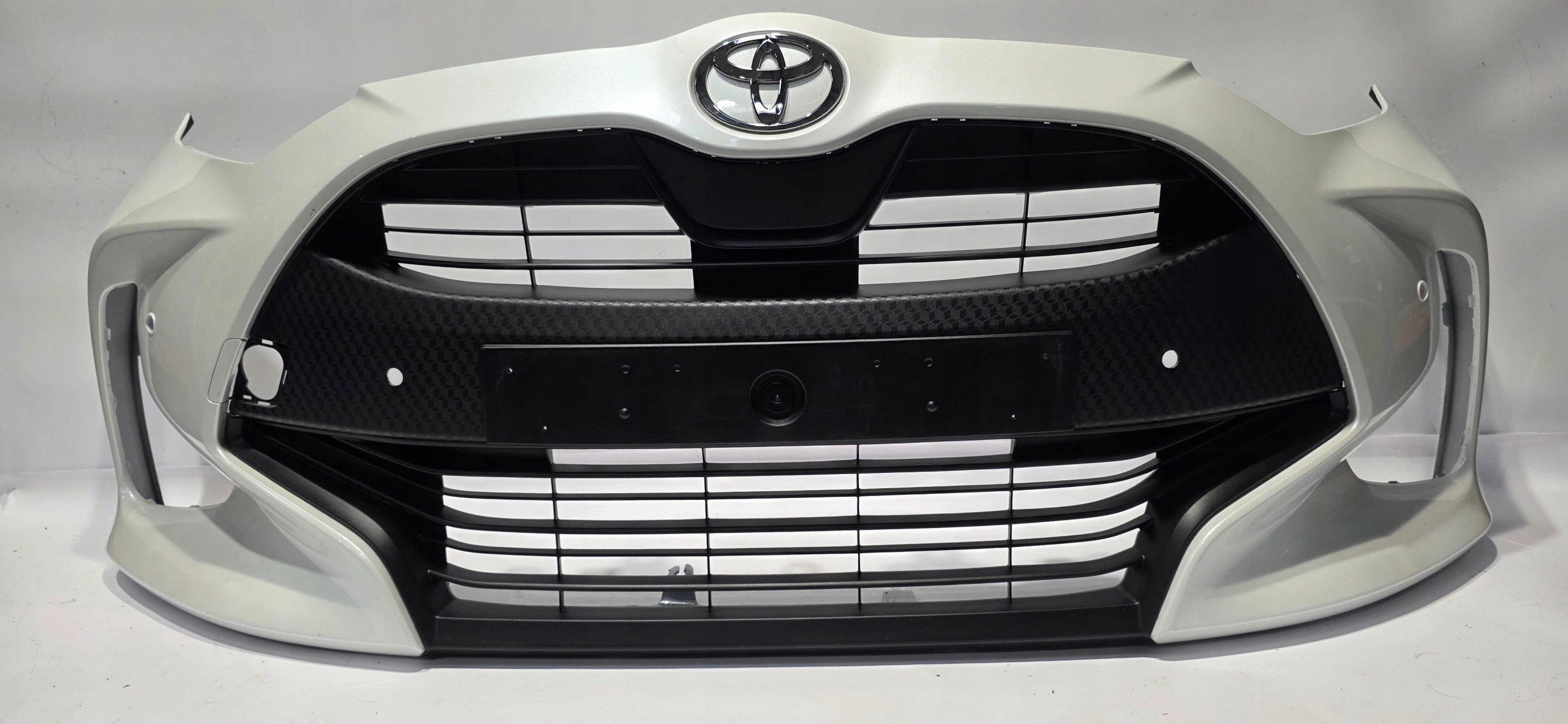 front bumper grille TOYOTA YARIS IV 20- PDC original 52119-0DA00