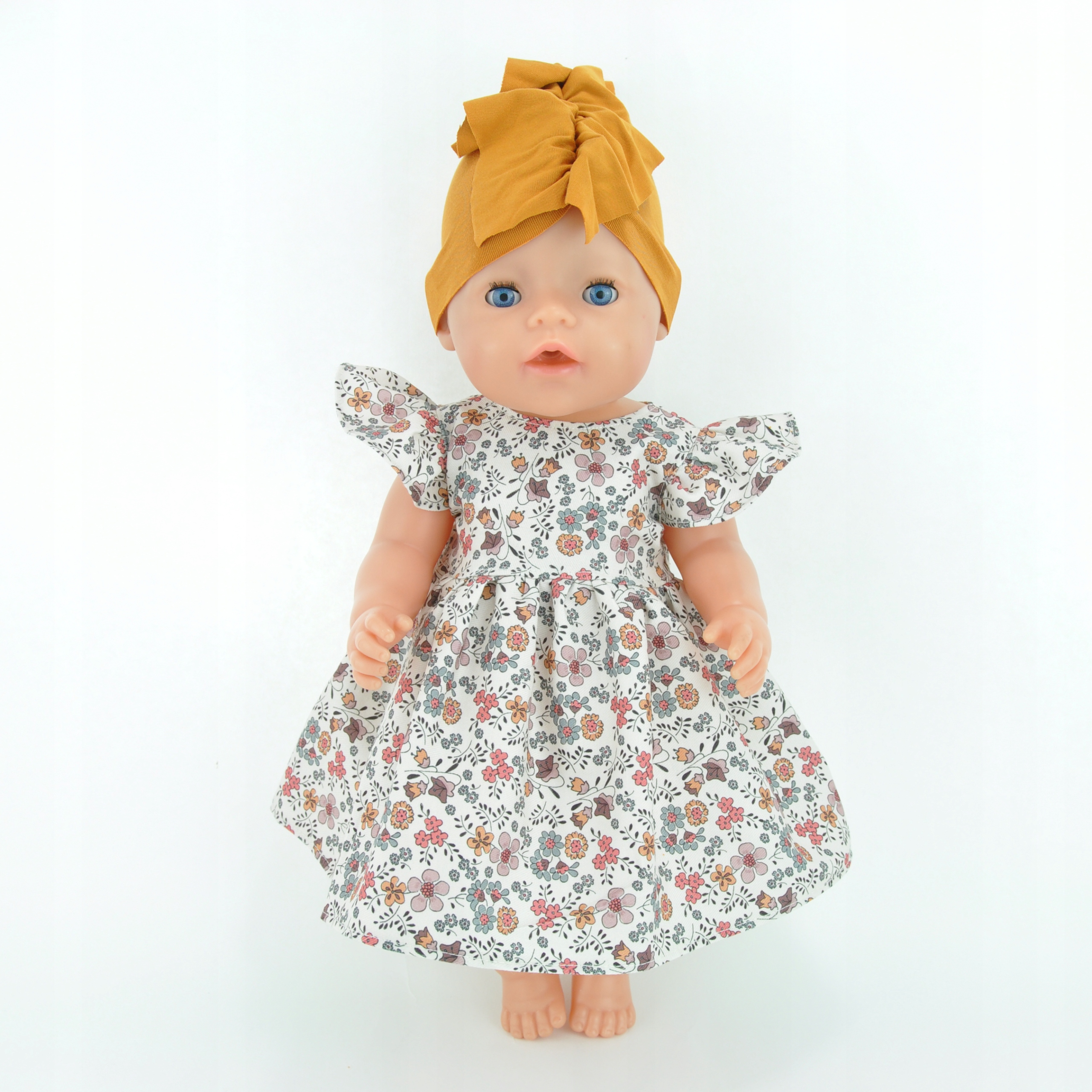 

Sukienka i żółty turban dla lalki Baby Born 43cm