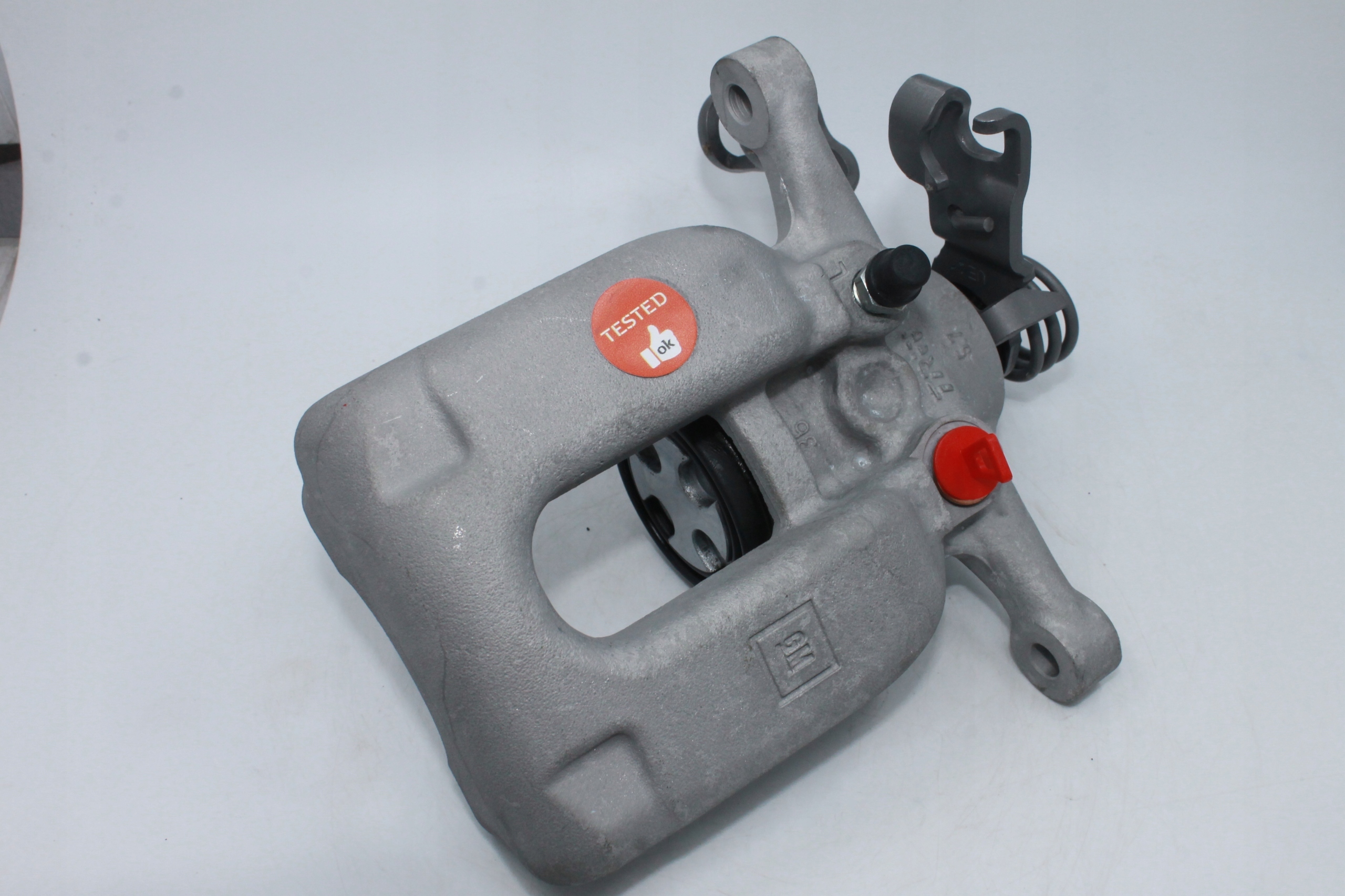 Zacisk LEWY tył ASTRA K