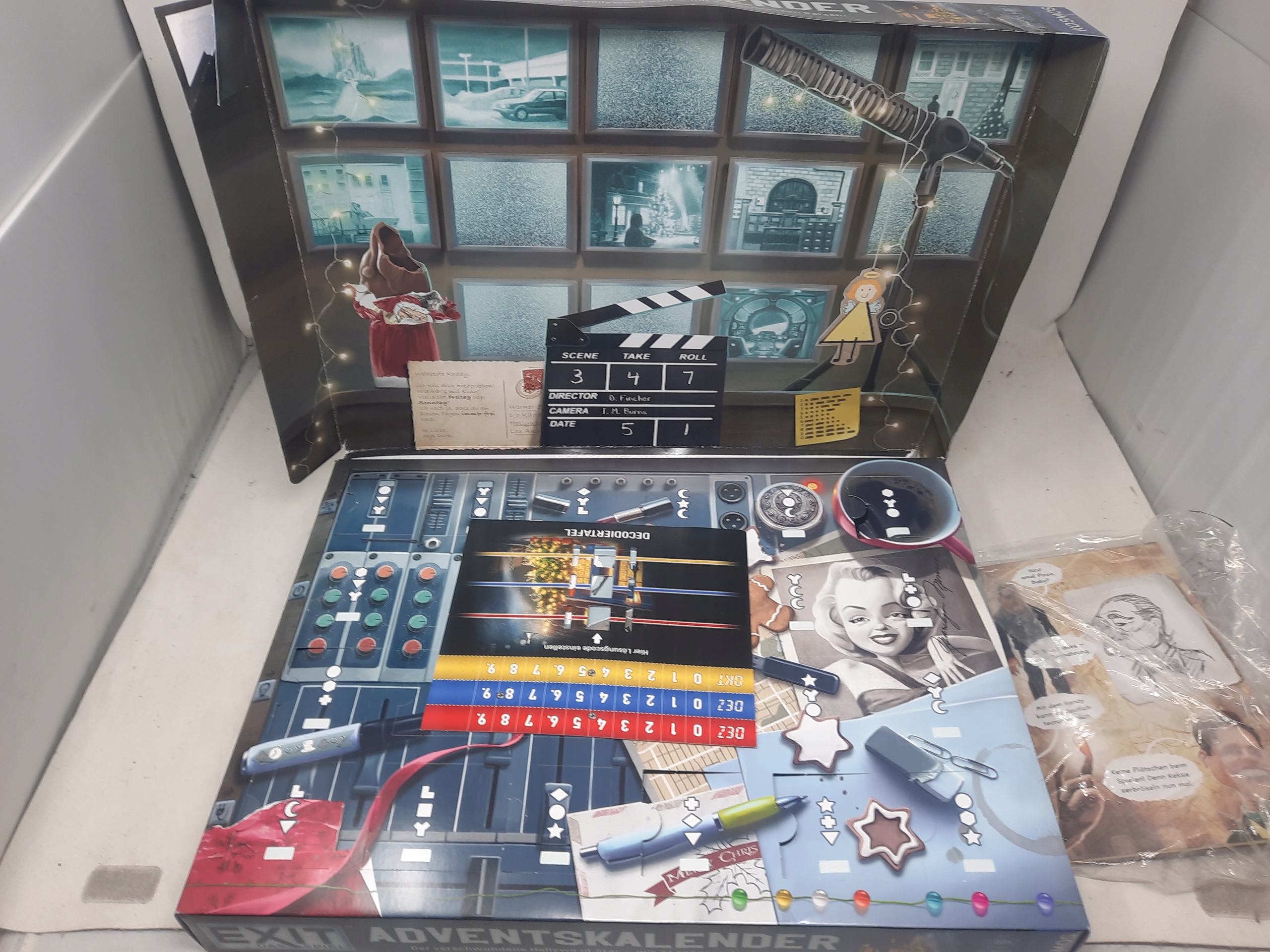 Адвент-календарь Kosmos EXIT, 24 игры и головоломки для всей семьи, на немецком языке — фото 4