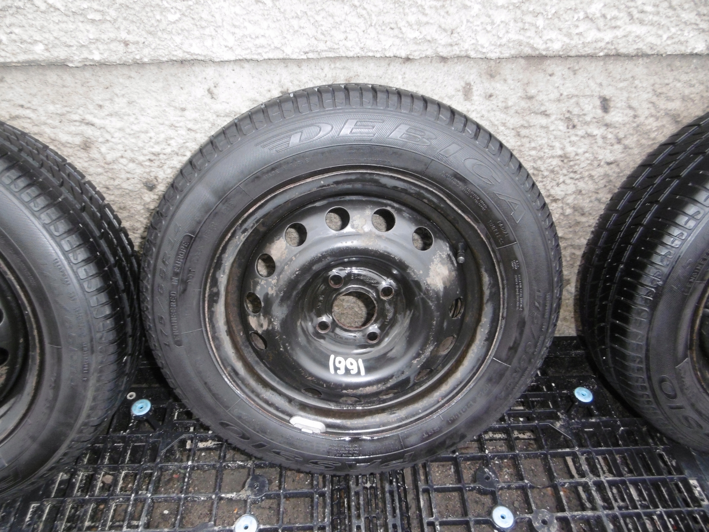 discs metal + tyres 14 175/65 4x100 ET49 OPEL