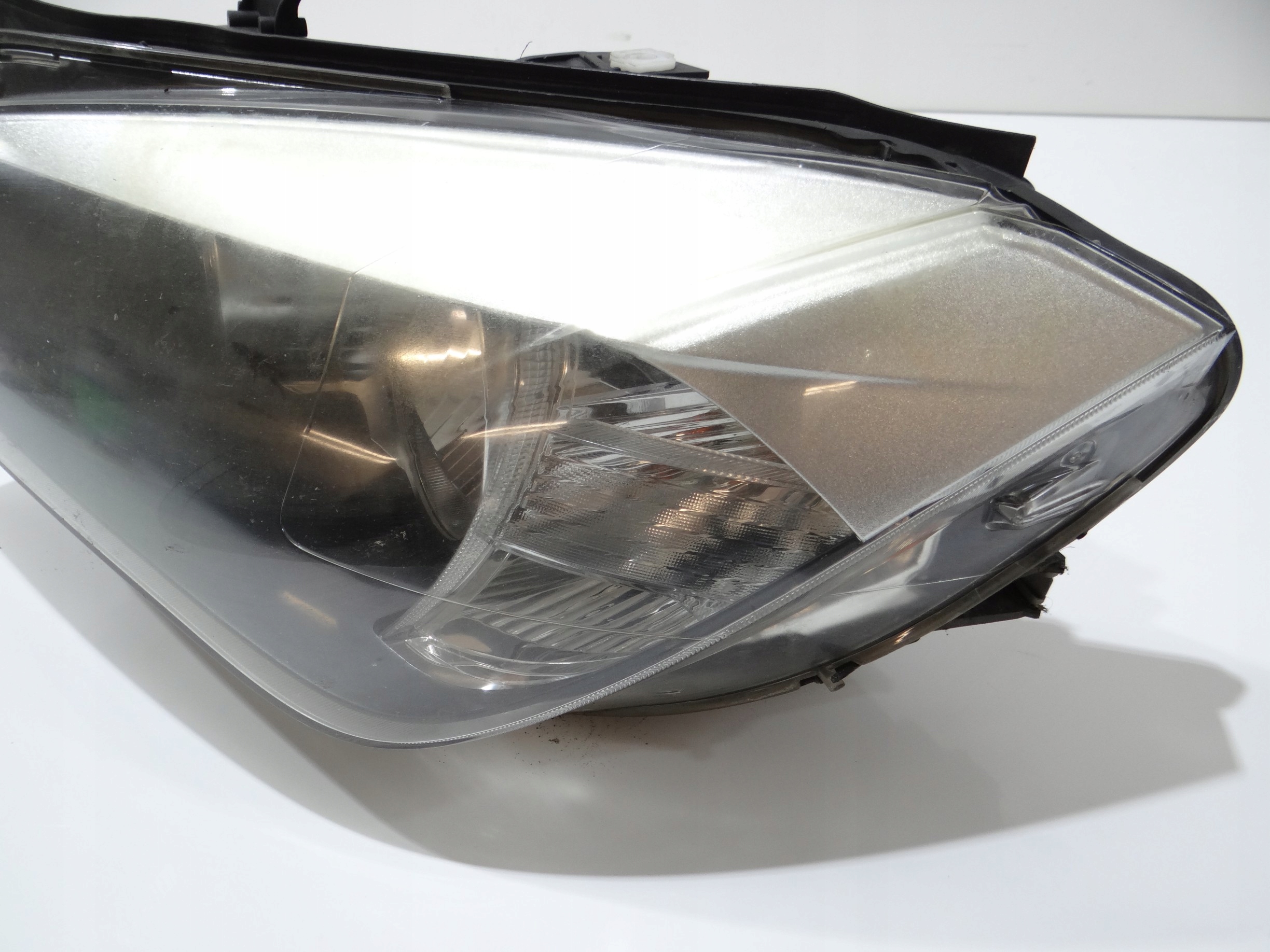 light left front BMW X1 E84 H7 7290235 (17245739)