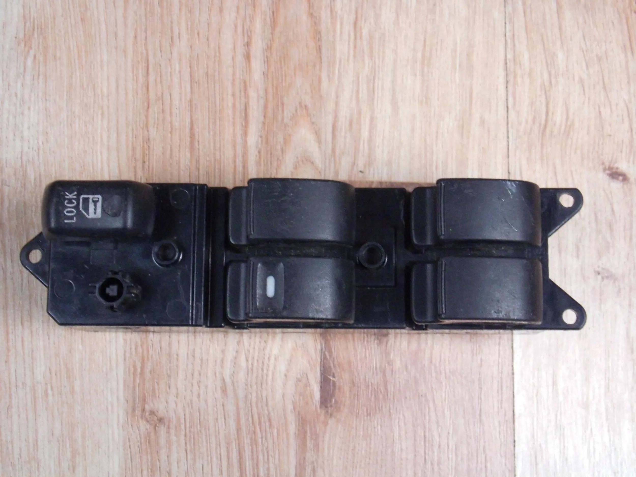 Mitsubishi Lancer VIII X window control switch left
