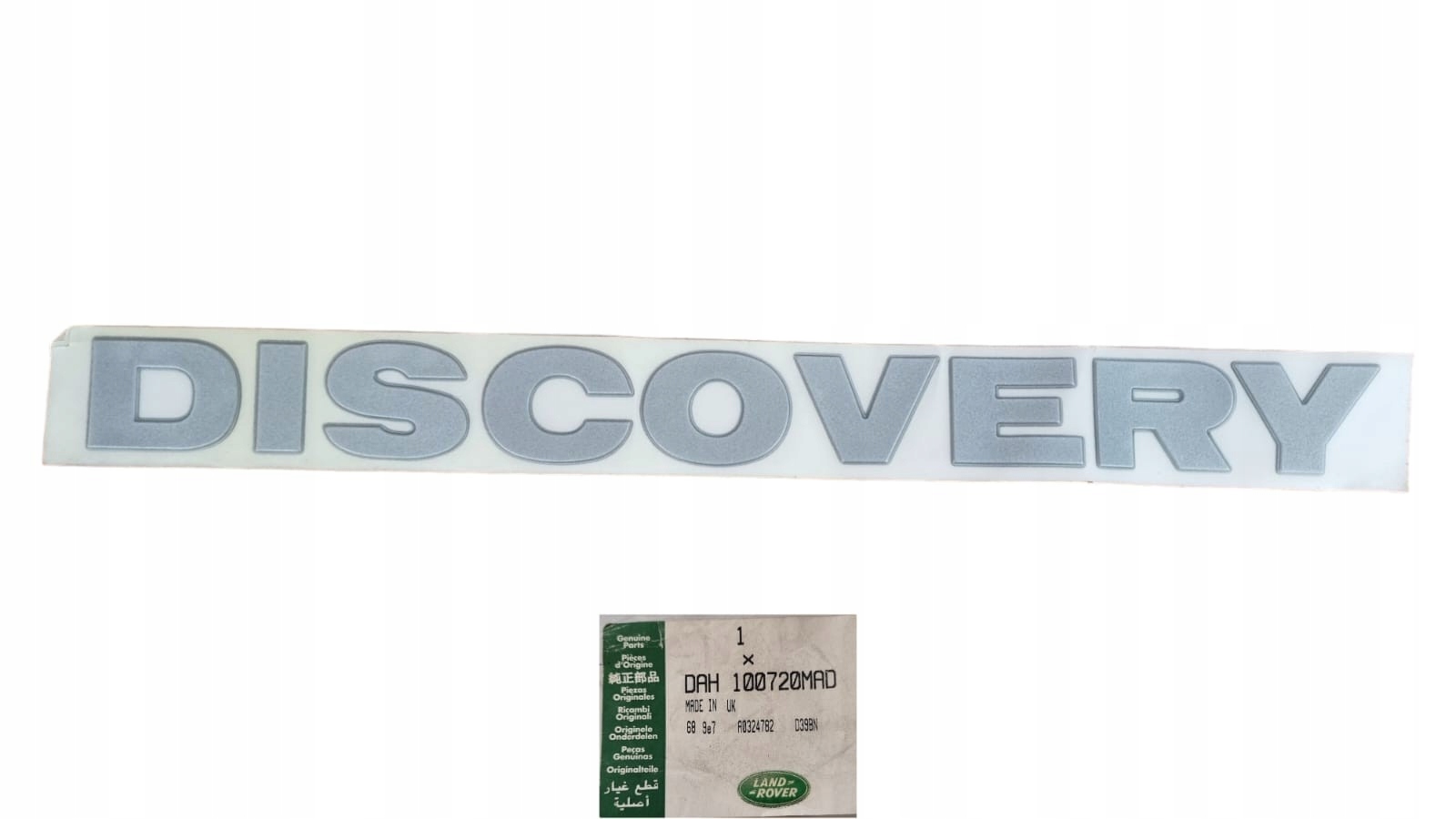 Naklejka EMBLEMAT "Discovery" drzwi tył LAND ROVER DAH100720MAD