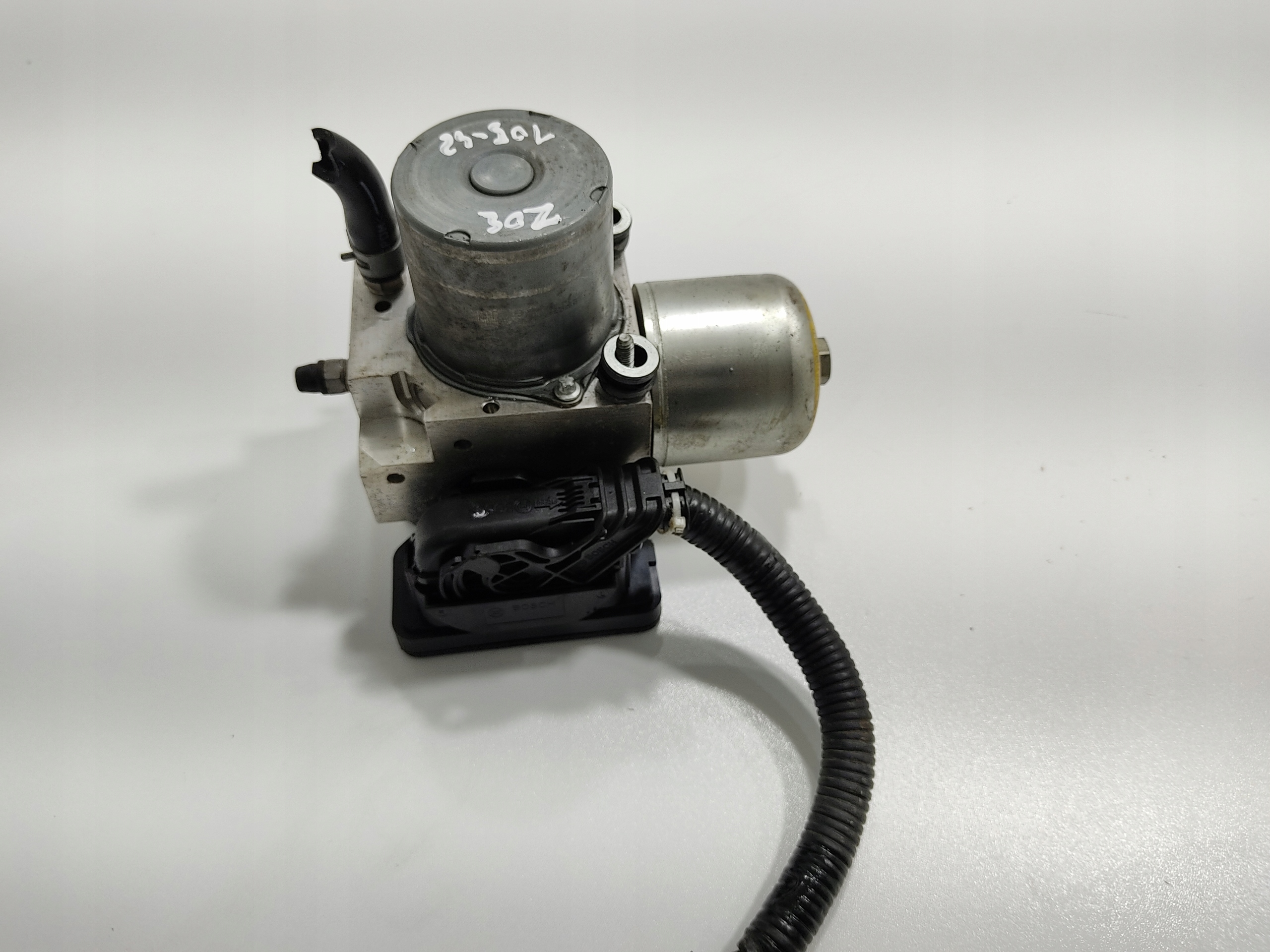 pump control unit ABS NISSAN E-NV200 ELEKTRYK 475004FA0A 2014-2021