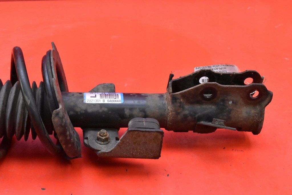 shock absorber left front DF7134900F MAZDA 2 II DE 1.3 16V 75 KM 07-10
