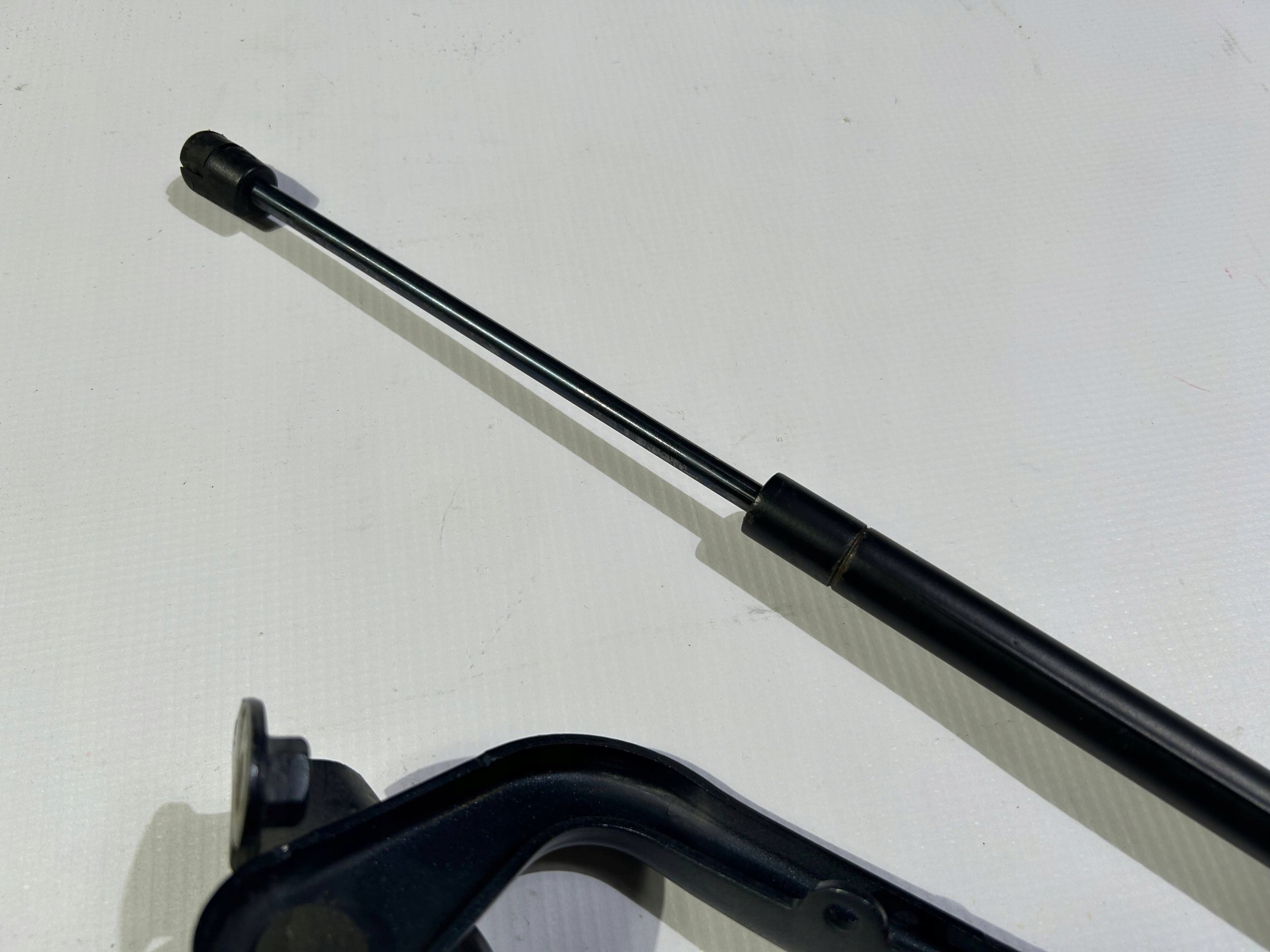 hinge bonnets left damper pokrywy of the engine original Dodge RAM 1500 2009