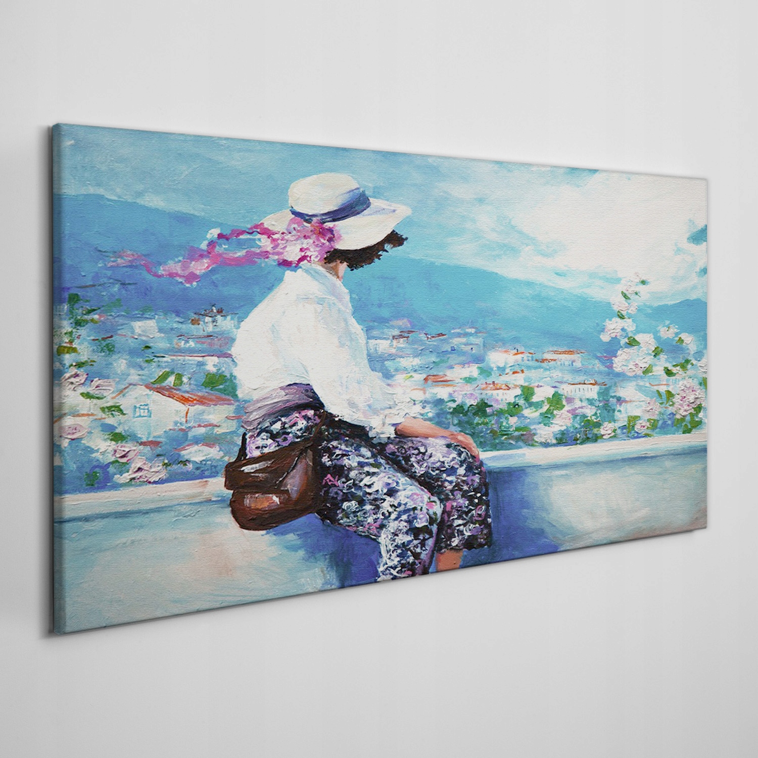 

Obraz płótno Kobiety pejzaż miejski góry 140x70 cm