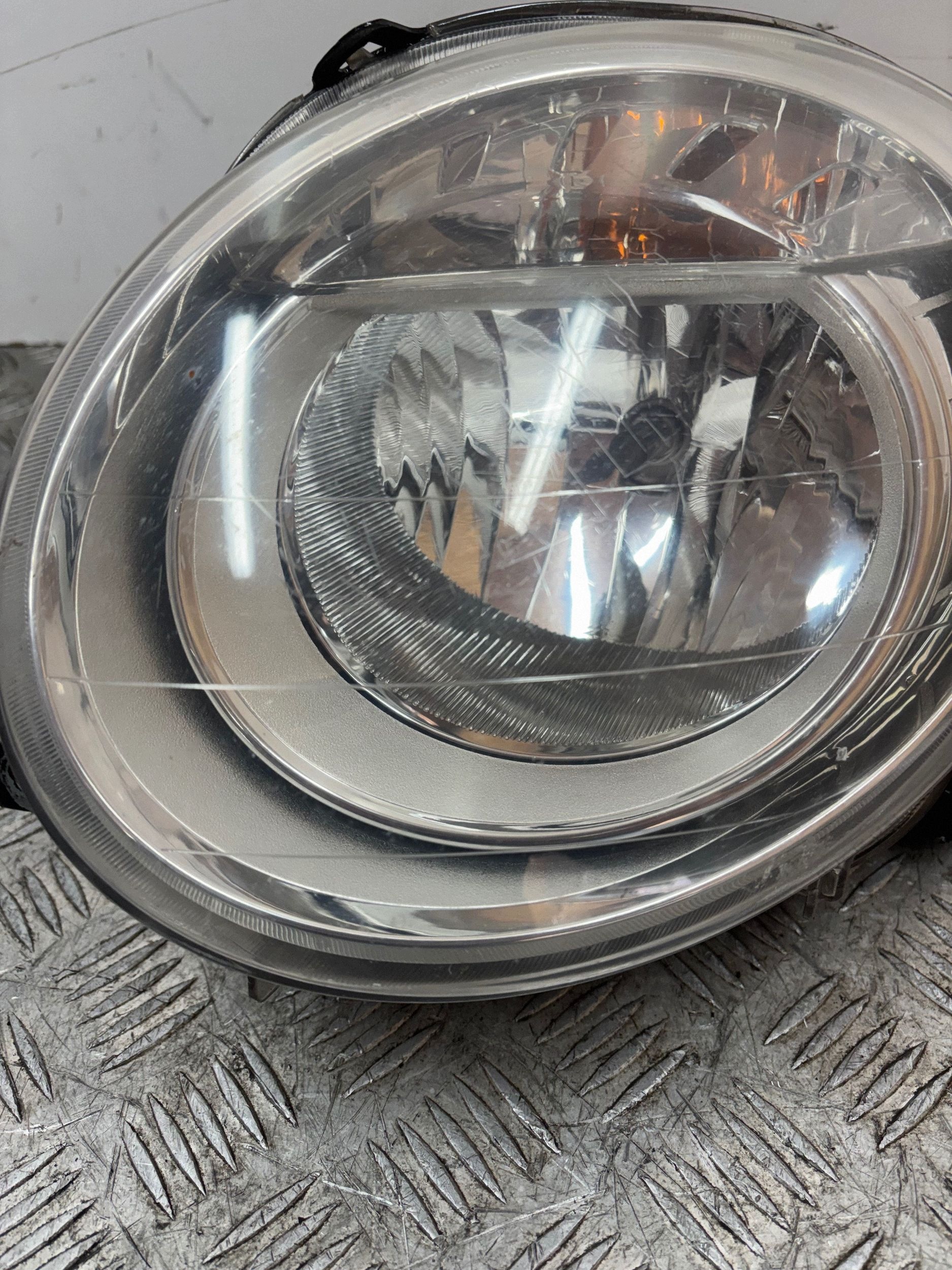 REFLEKTOR light left FIAT 500 07