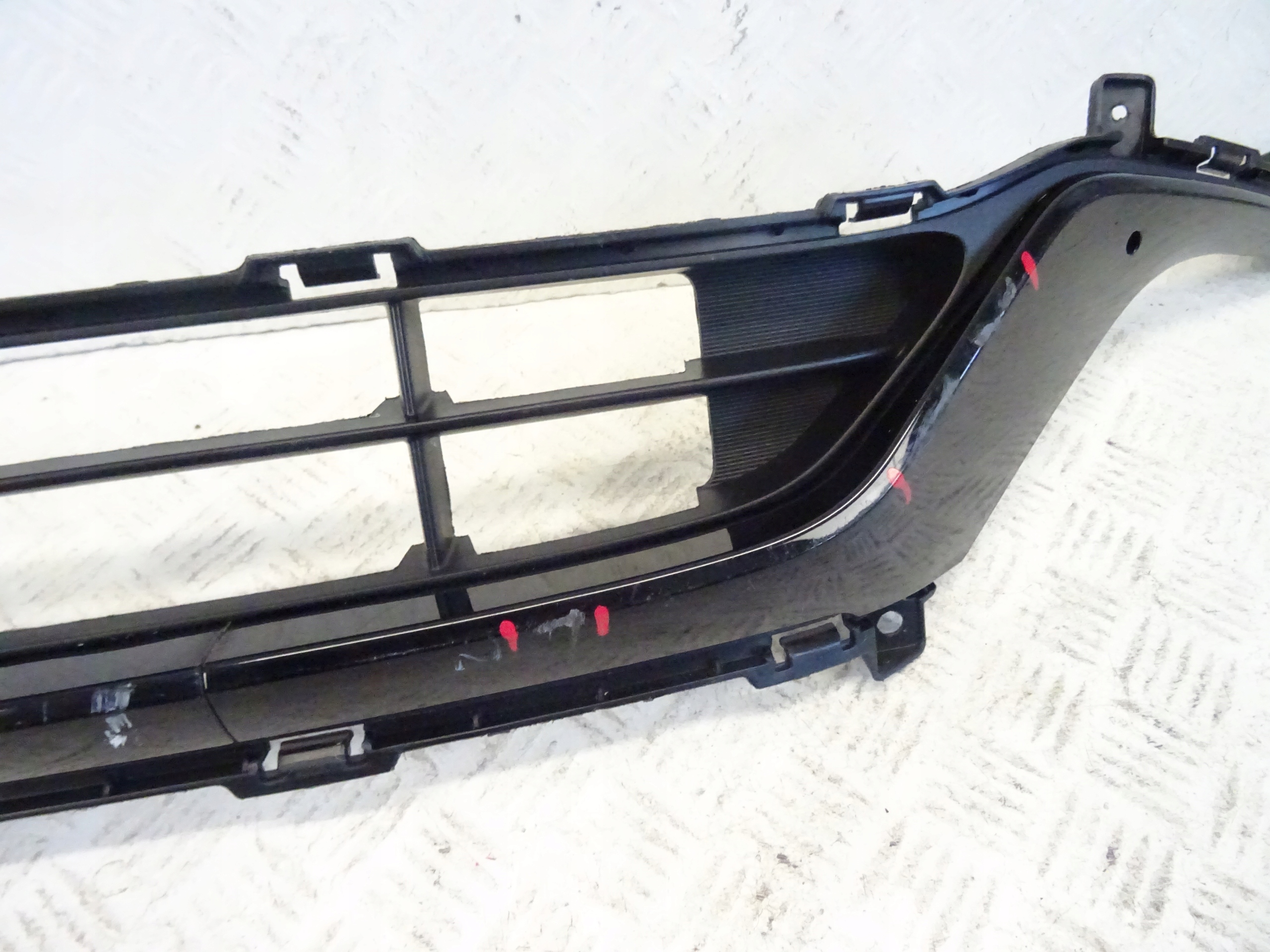 grid of a bumper front front central KIA VENGA LIFT 86560-1P500