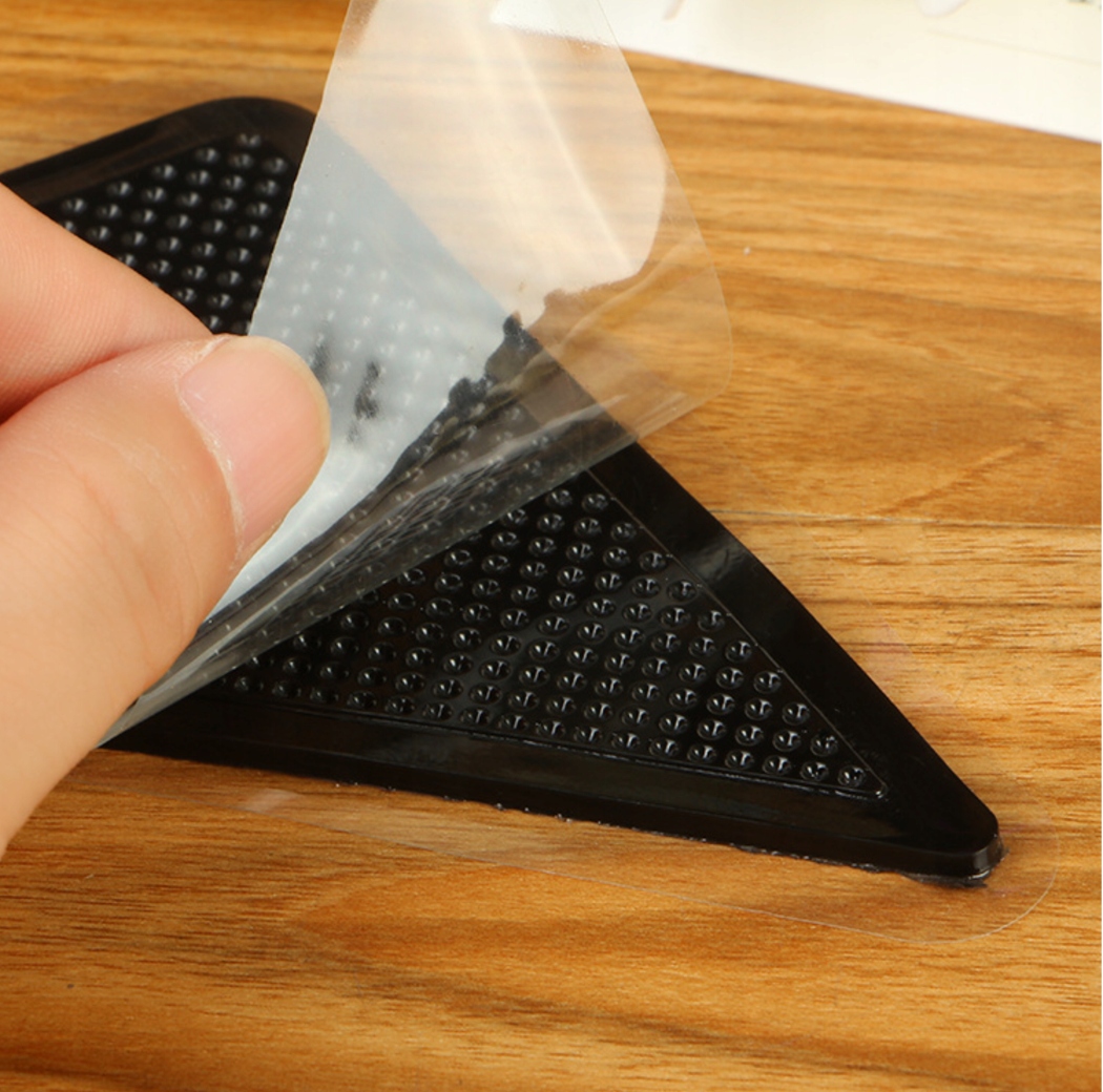 PODKŁADKI ANTYPOŚLIZGOWE POD DYWAN WYKŁADZINĘ ZABEZPIECZENIE KOMPLET 8 SZT Kod producenta 86901995