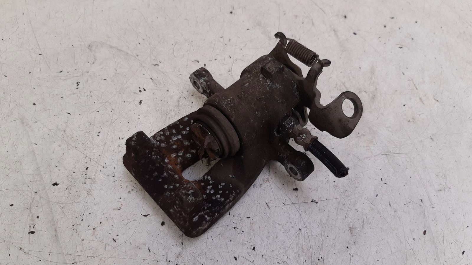 caliper rear part rear left Opel Tigra B 1,8