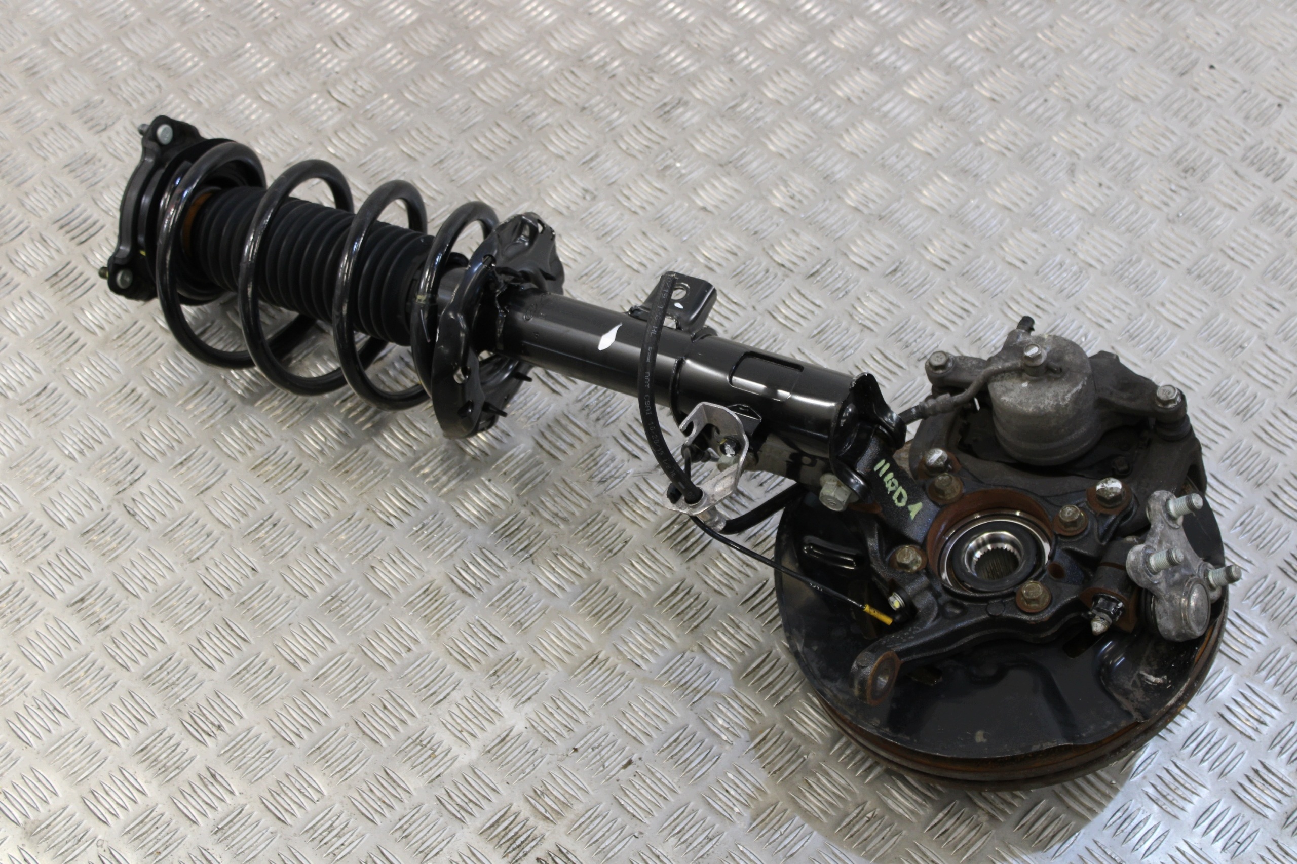 swing McPherson left front HYUNDAI TUCSON III 3 LIFT