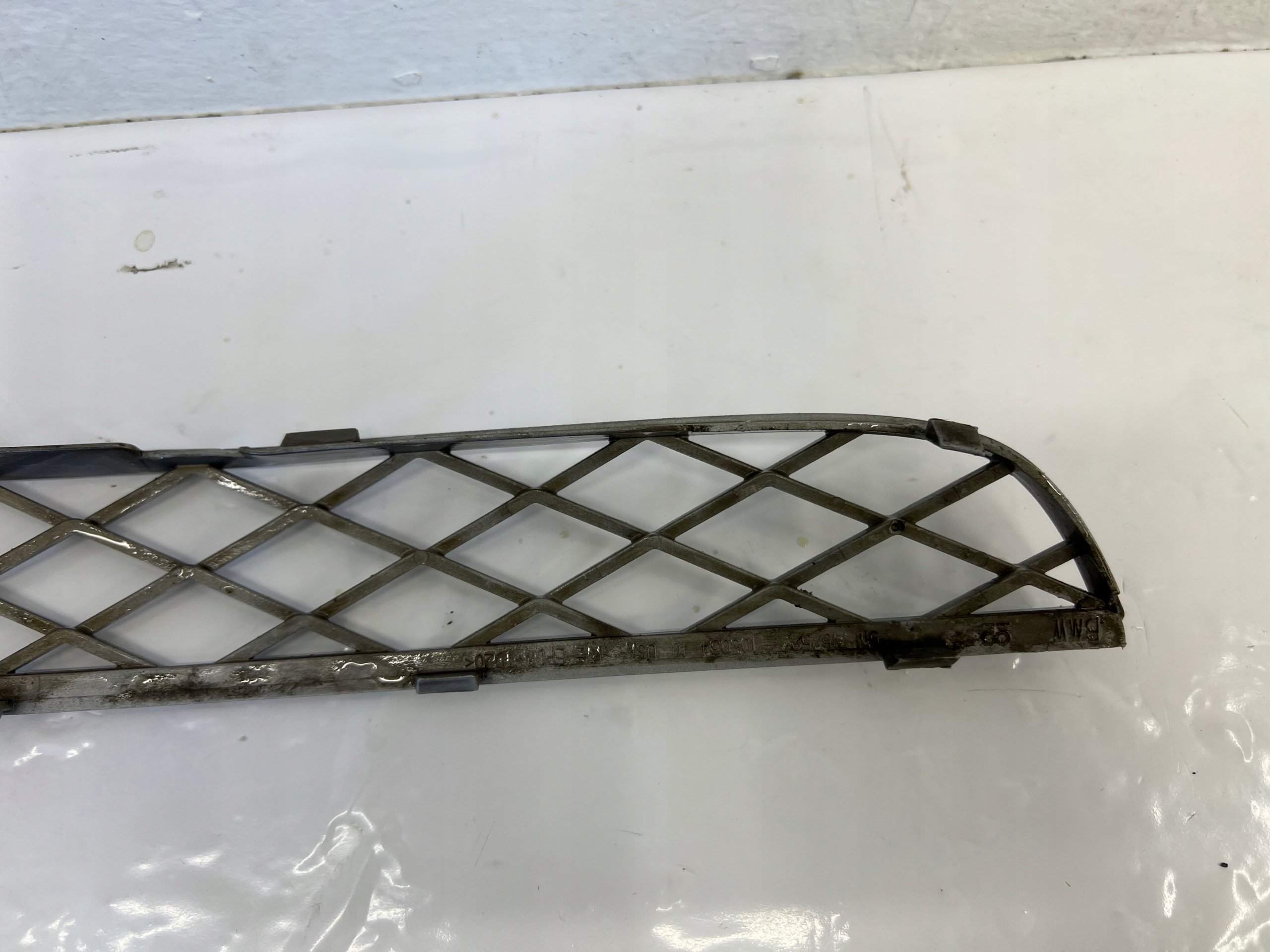 BMW X5 E70 LCI moulding grid central of a bumper front 7159597