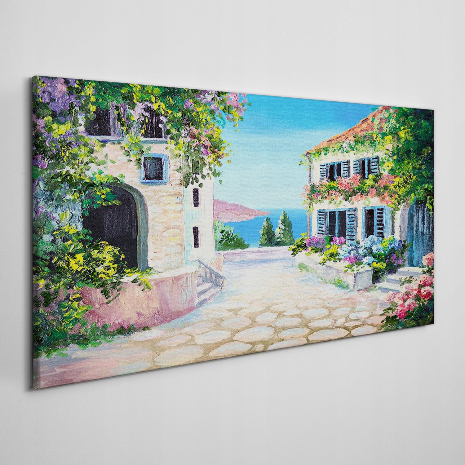 

Obraz na płótnie Santorini morze kwiaty 140x70 cm